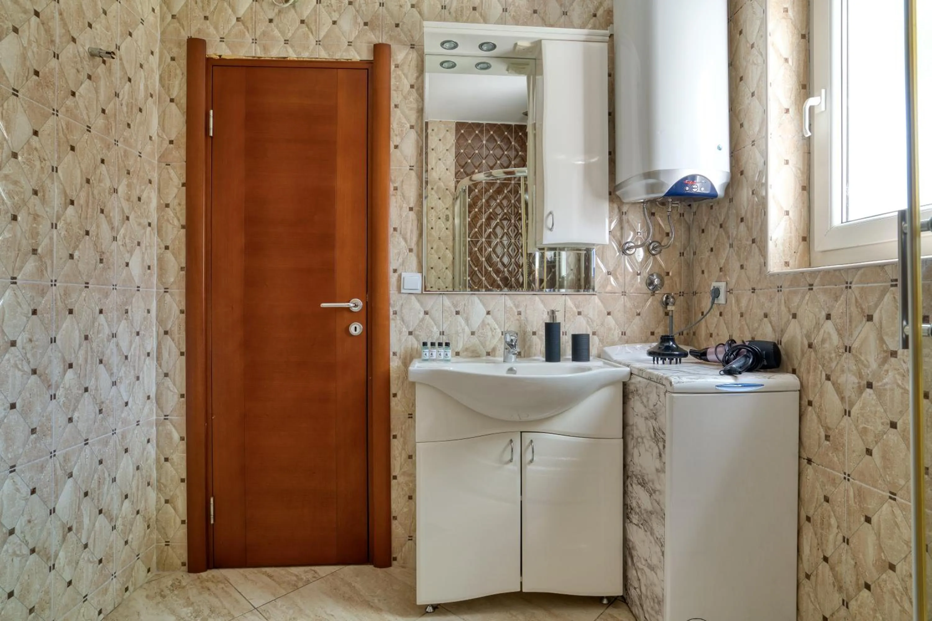 washing machine in Apartments Elena