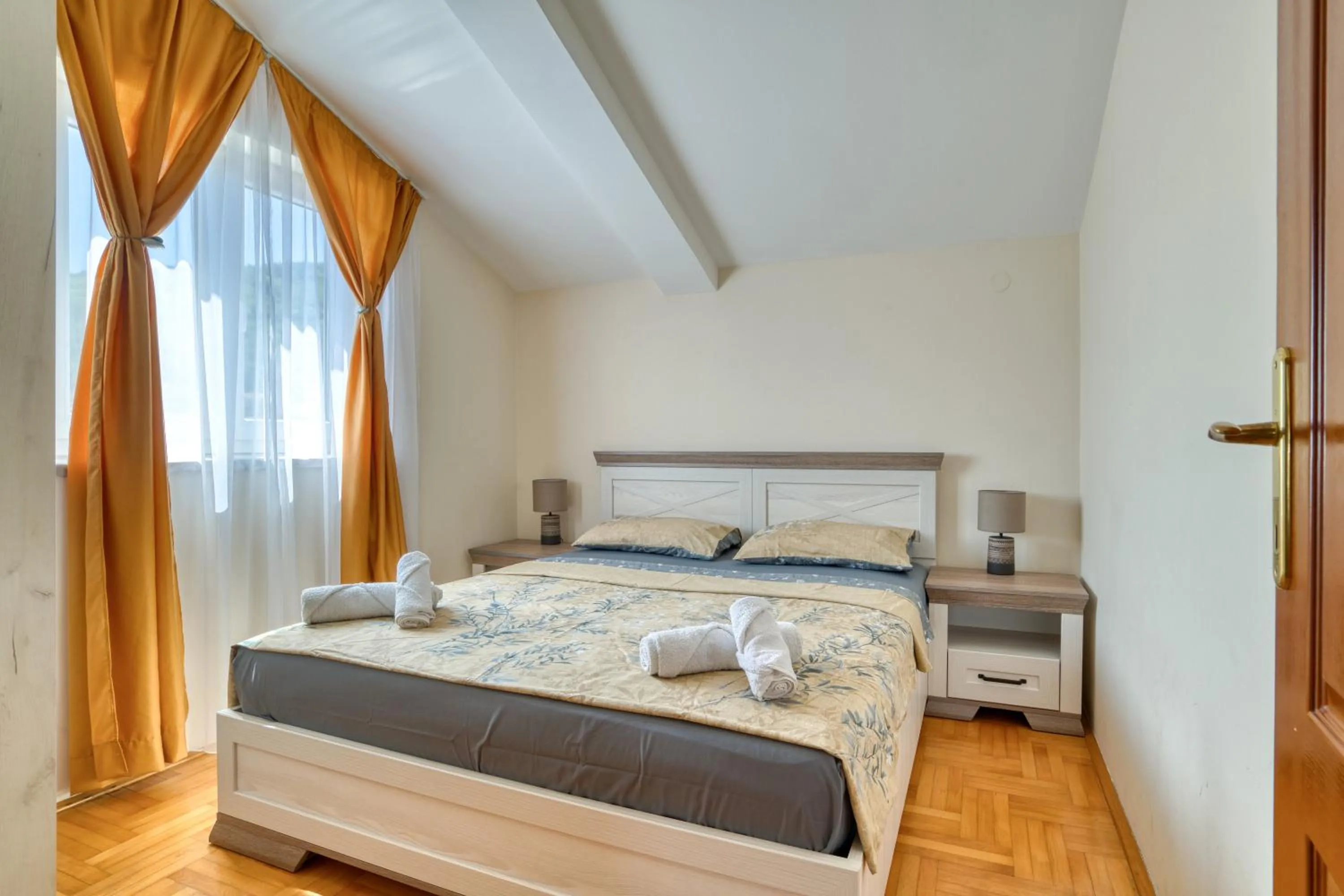 Living room, Bed in Apartments Elena