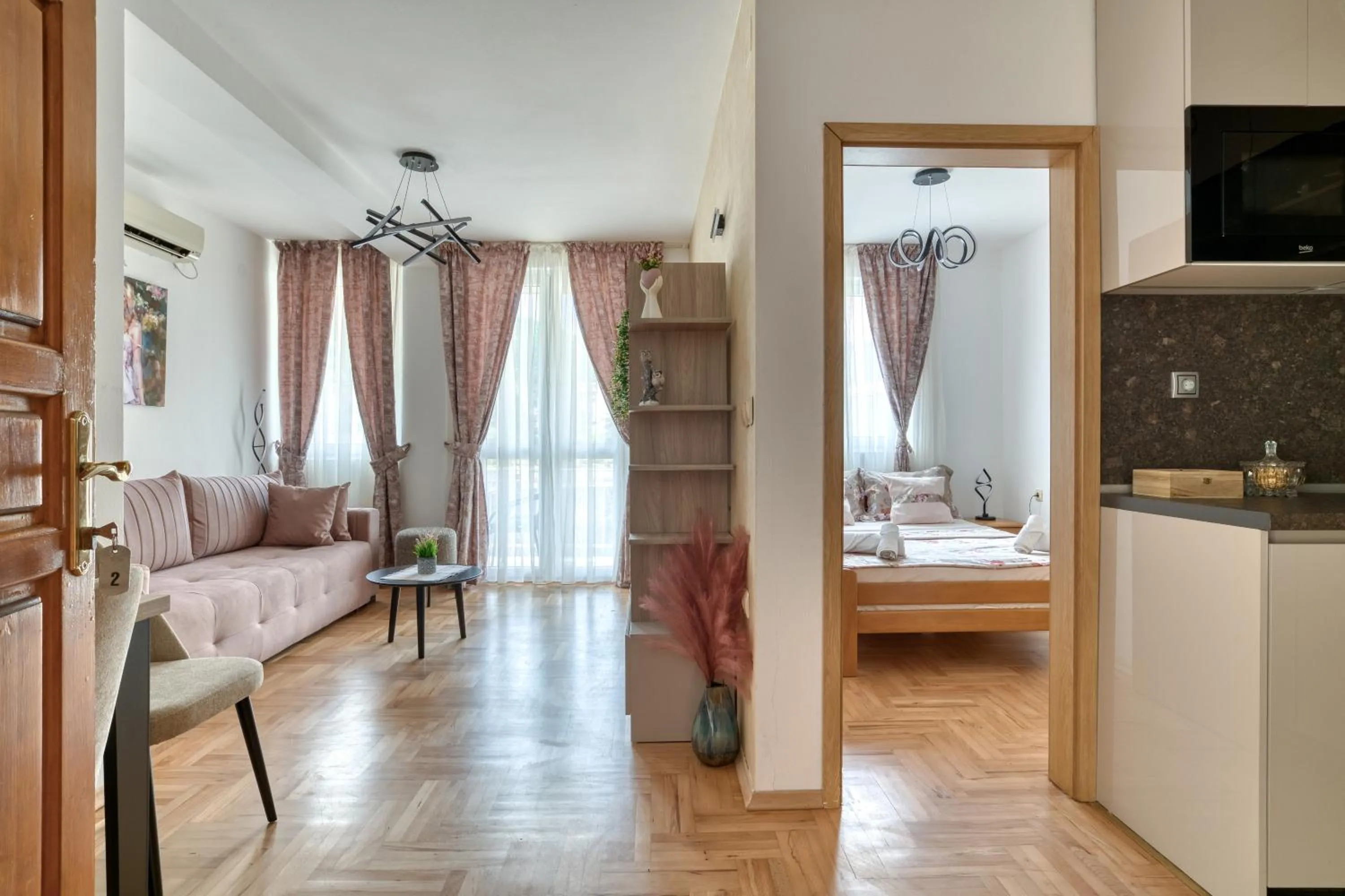 Kitchen or kitchenette, Bed in Apartments Elena