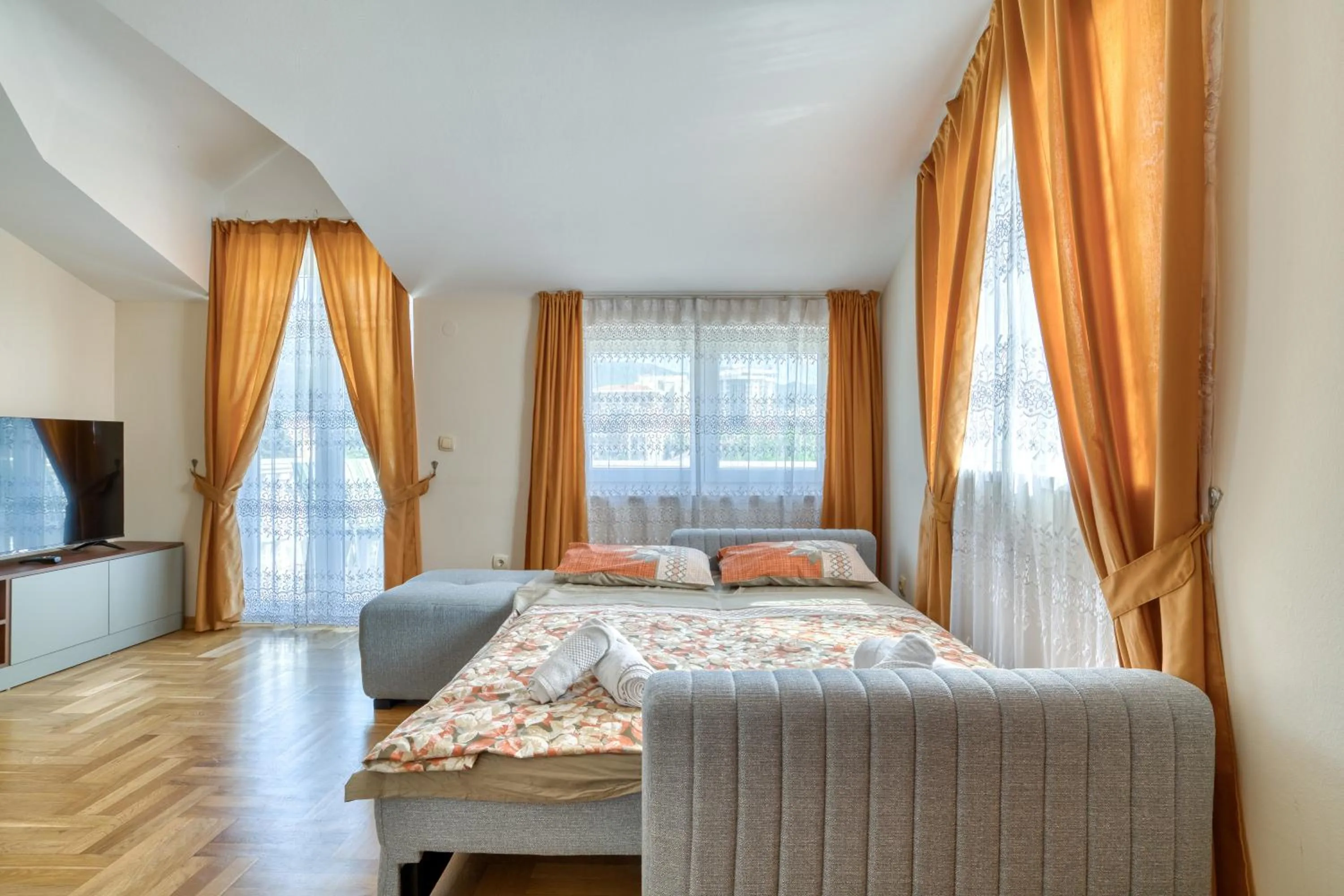 Living room, Bed in Apartments Elena