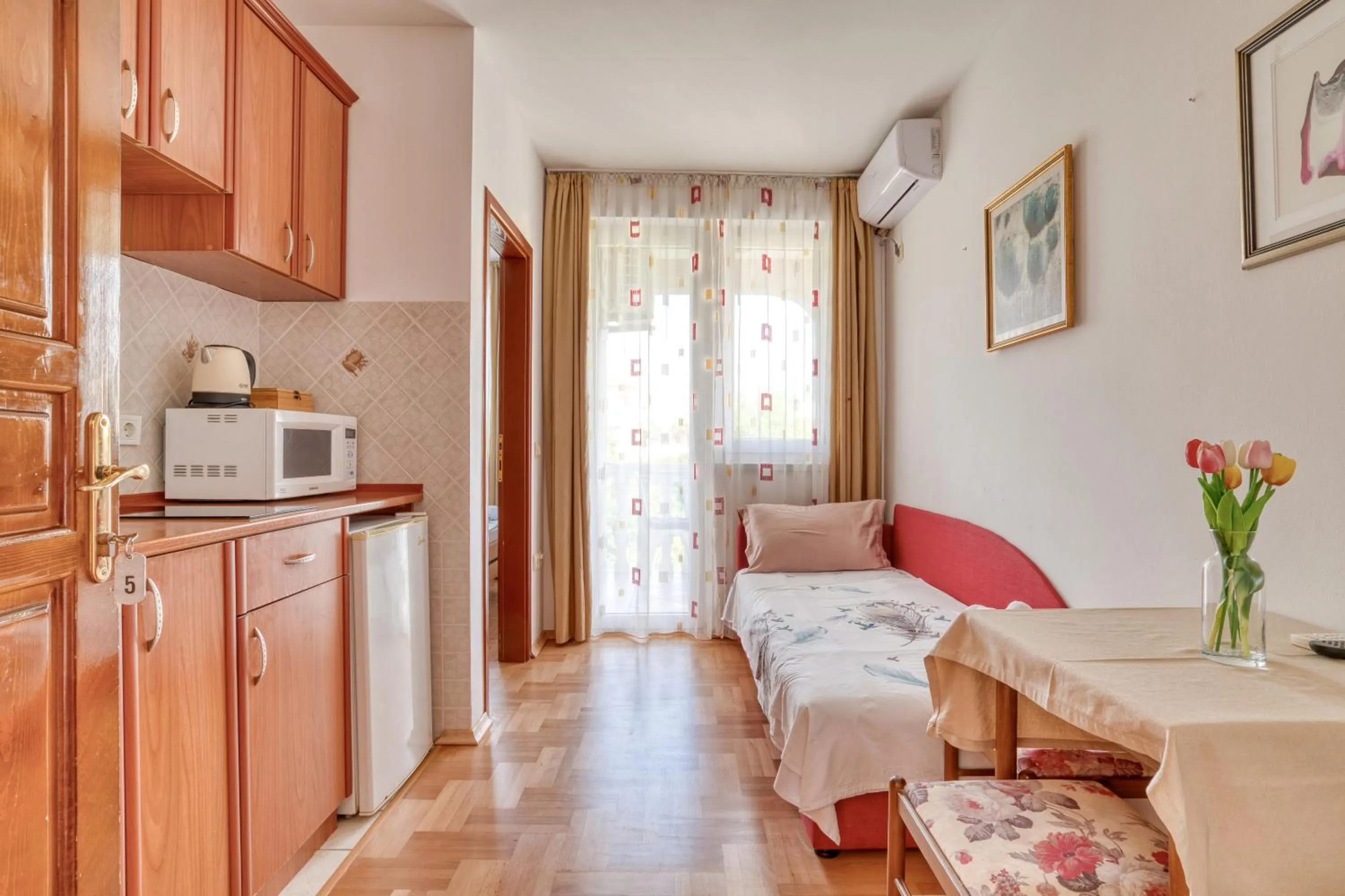 Living room, Bed in Apartments Elena