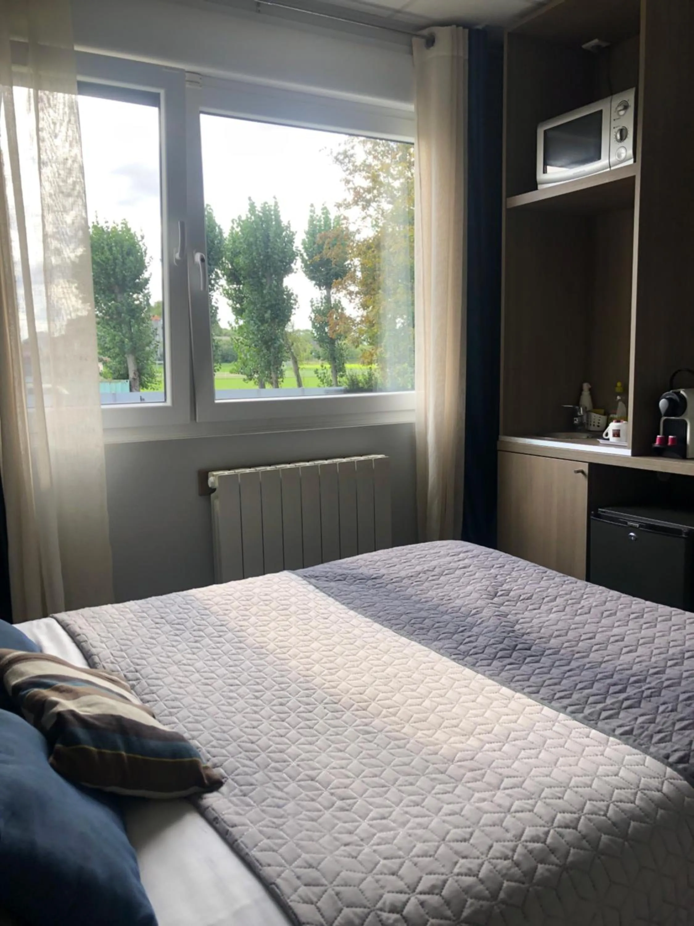 Bed in Résidence Cosyade équipée d'un parking privé gratuit