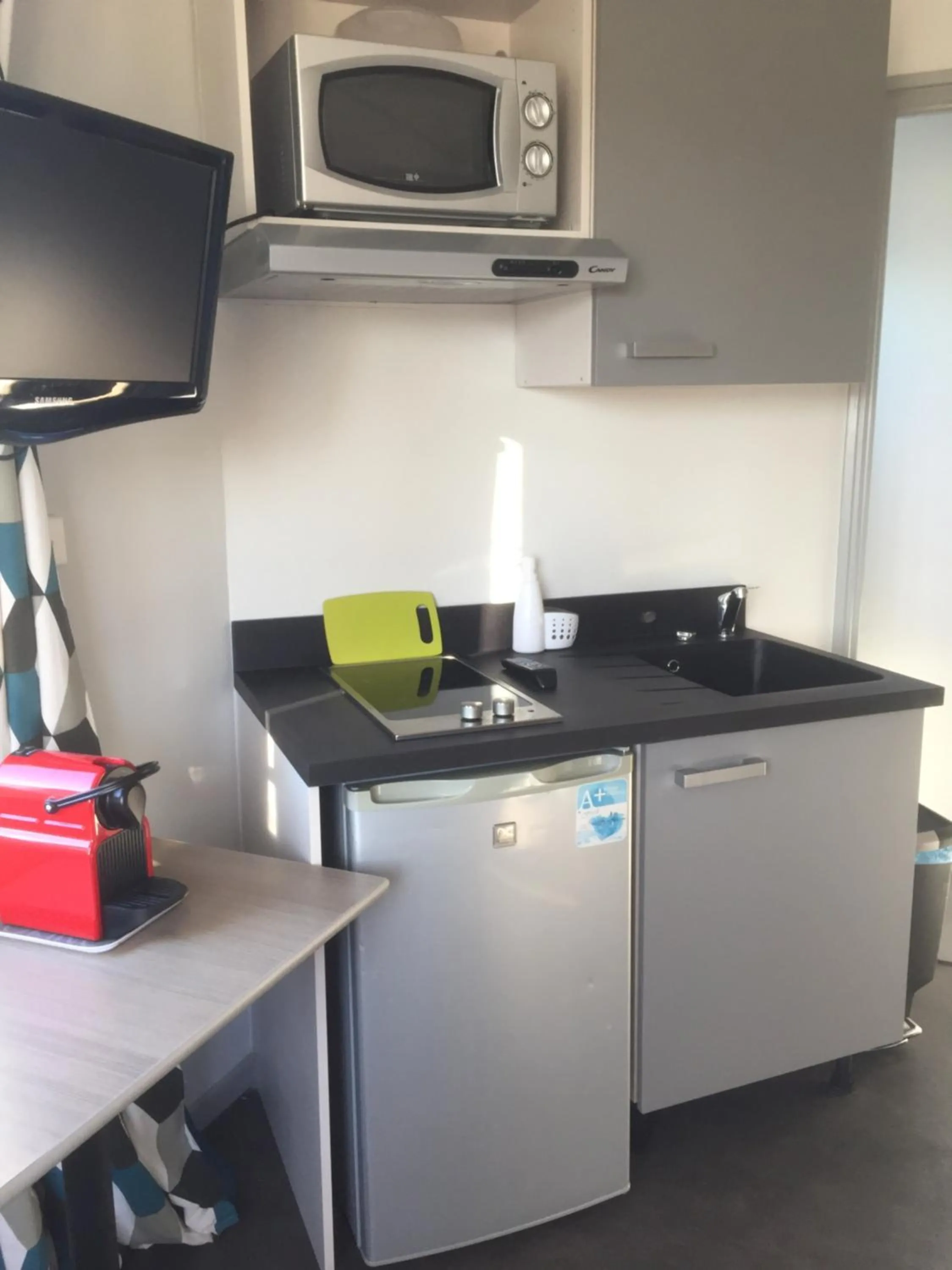 TV and multimedia in Résidence Cosyade équipée d'un parking privé gratuit