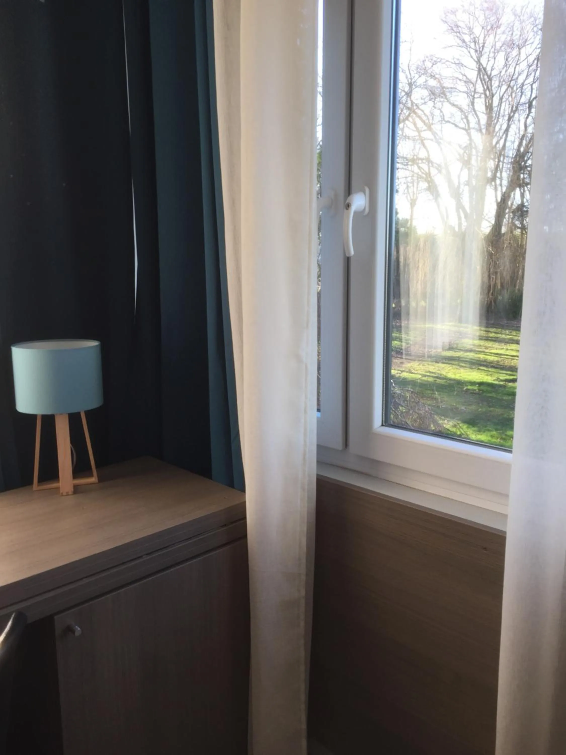 Garden view in Résidence Cosyade équipée d'un parking privé gratuit