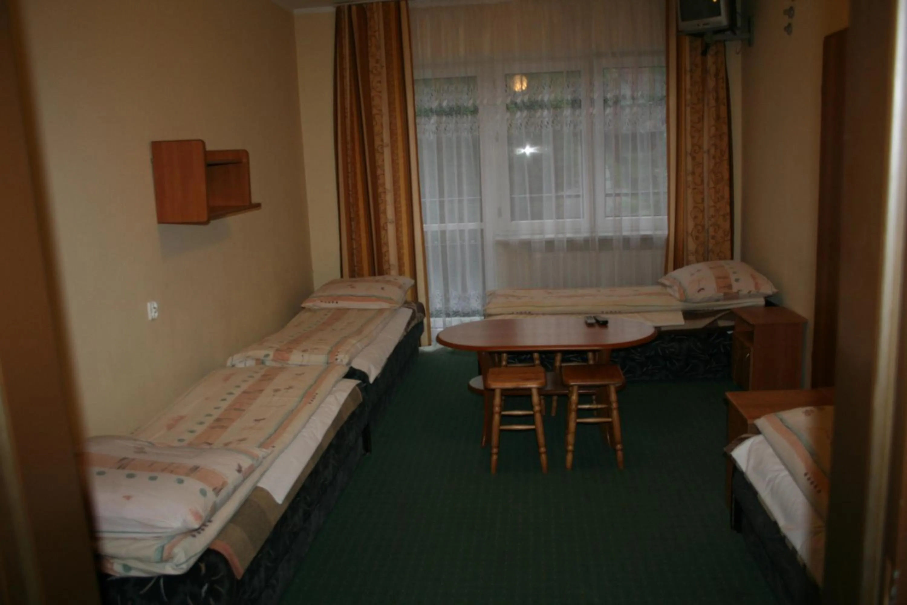 Photo of the whole room, Bed in Dom Wypoczynkowy Tulipan