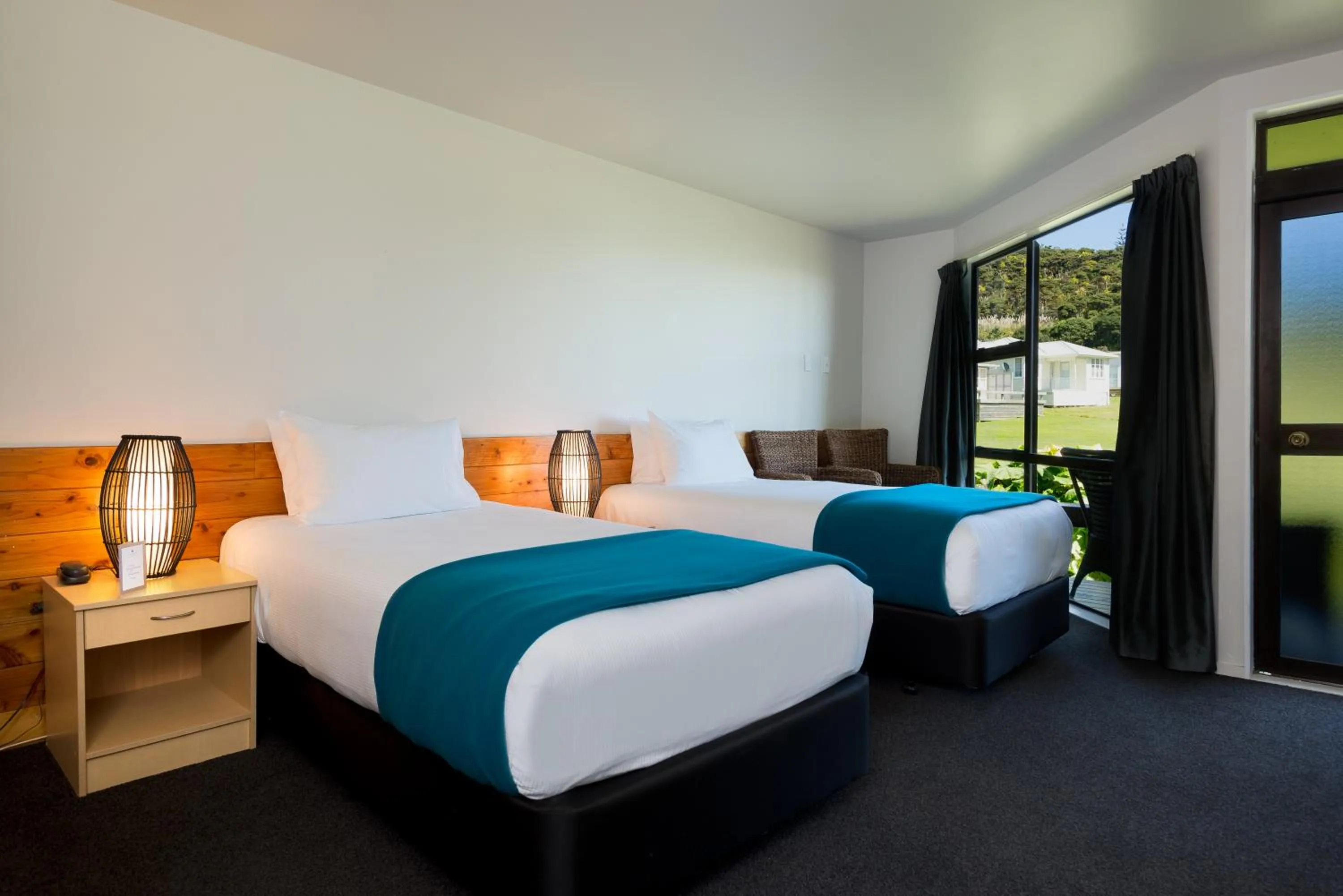 Bed in The Sands Hotel Hokianga