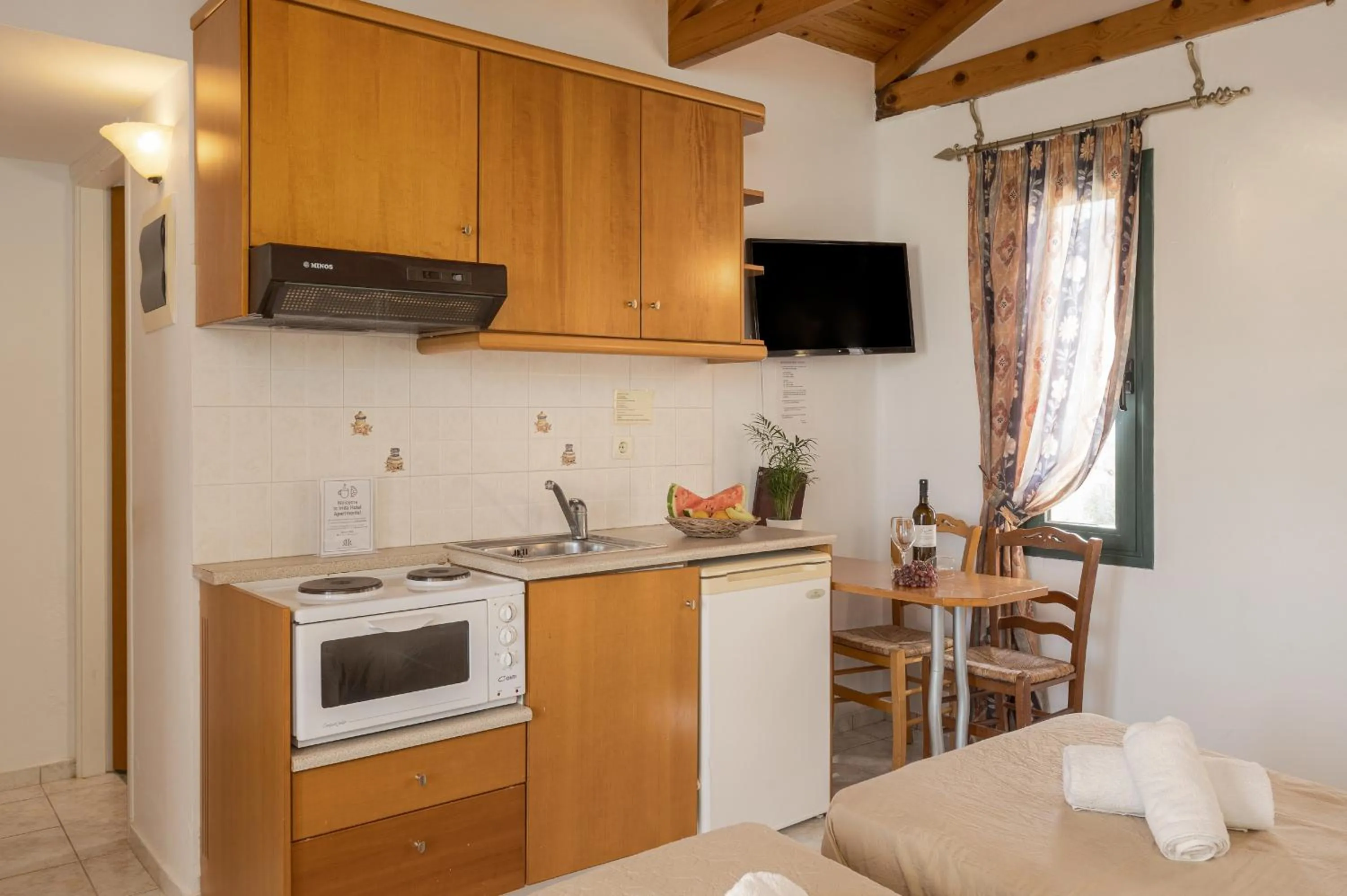 Kitchen or kitchenette in Irida Aparthotel Malia by Estia
