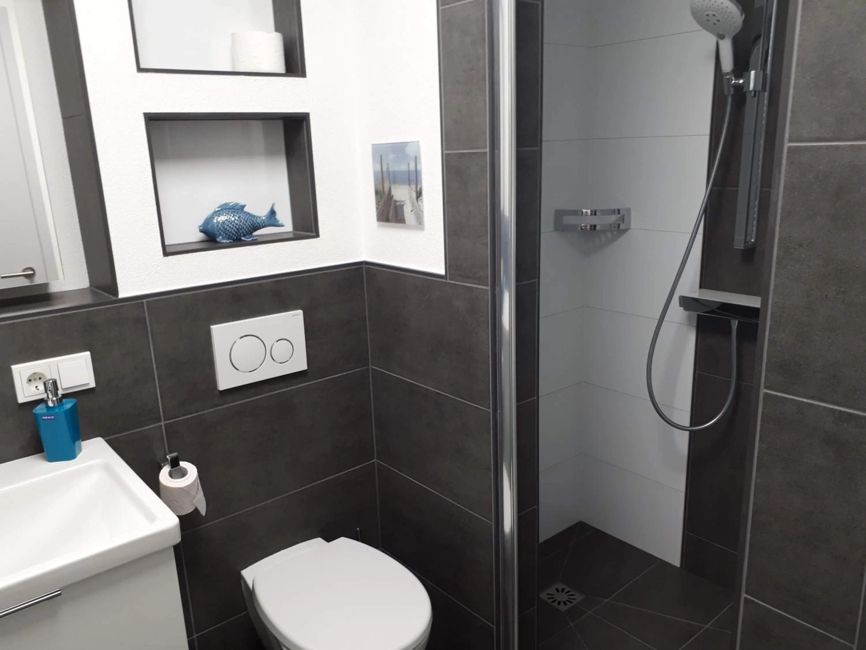 Shower in Aparthotel-Stadtallendorf