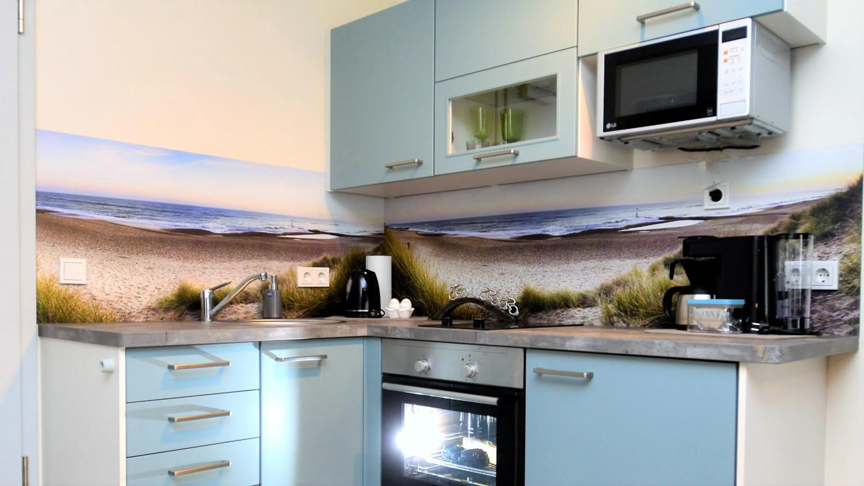 Kitchen or kitchenette in Aparthotel-Stadtallendorf