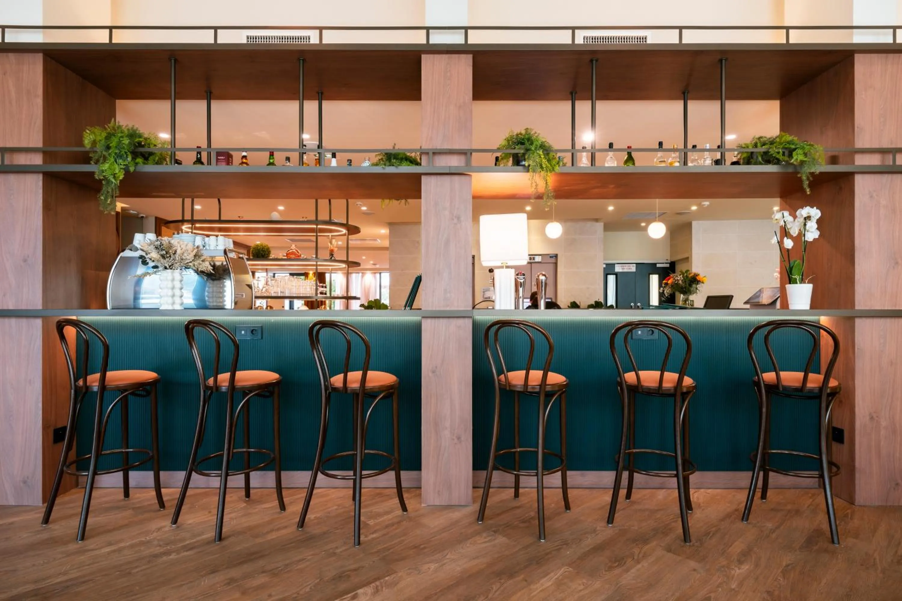 Communal lounge/ TV room in Mercure Villefranche-sur-Saône