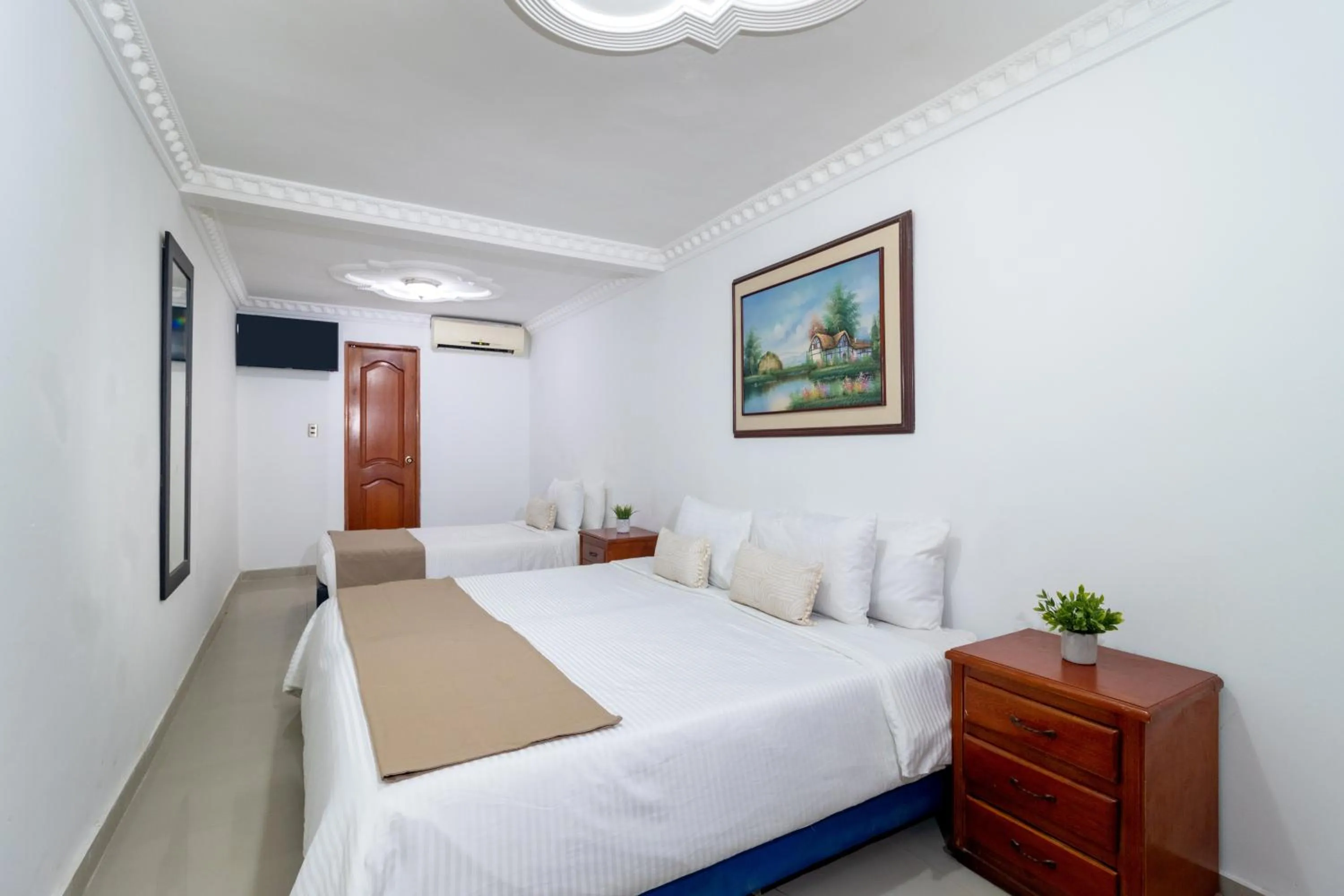 Photo of the whole room, Bed in Hotel Playa Salguero By GEH Suites