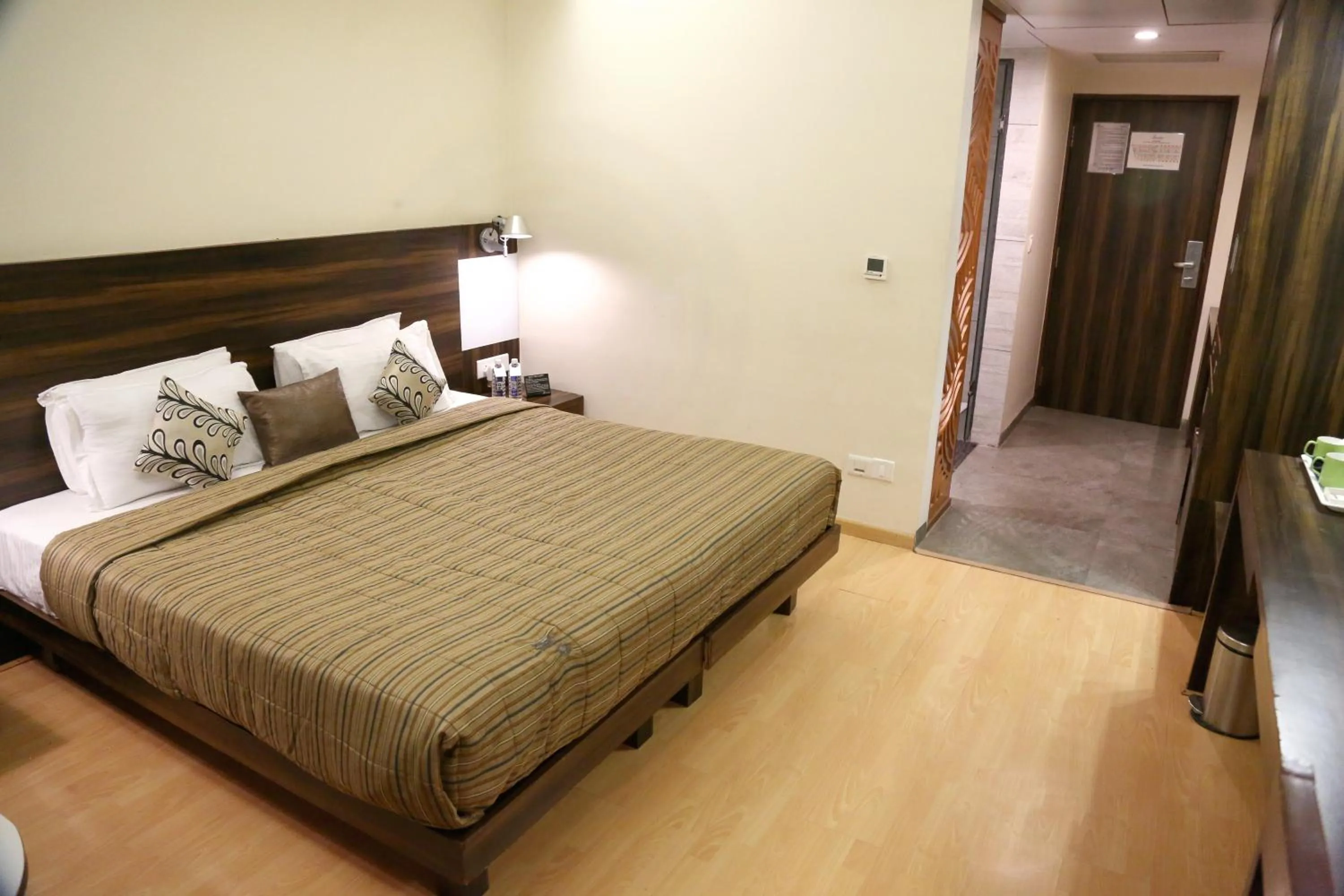 Bed in SilverCloud Hotel and Banquets