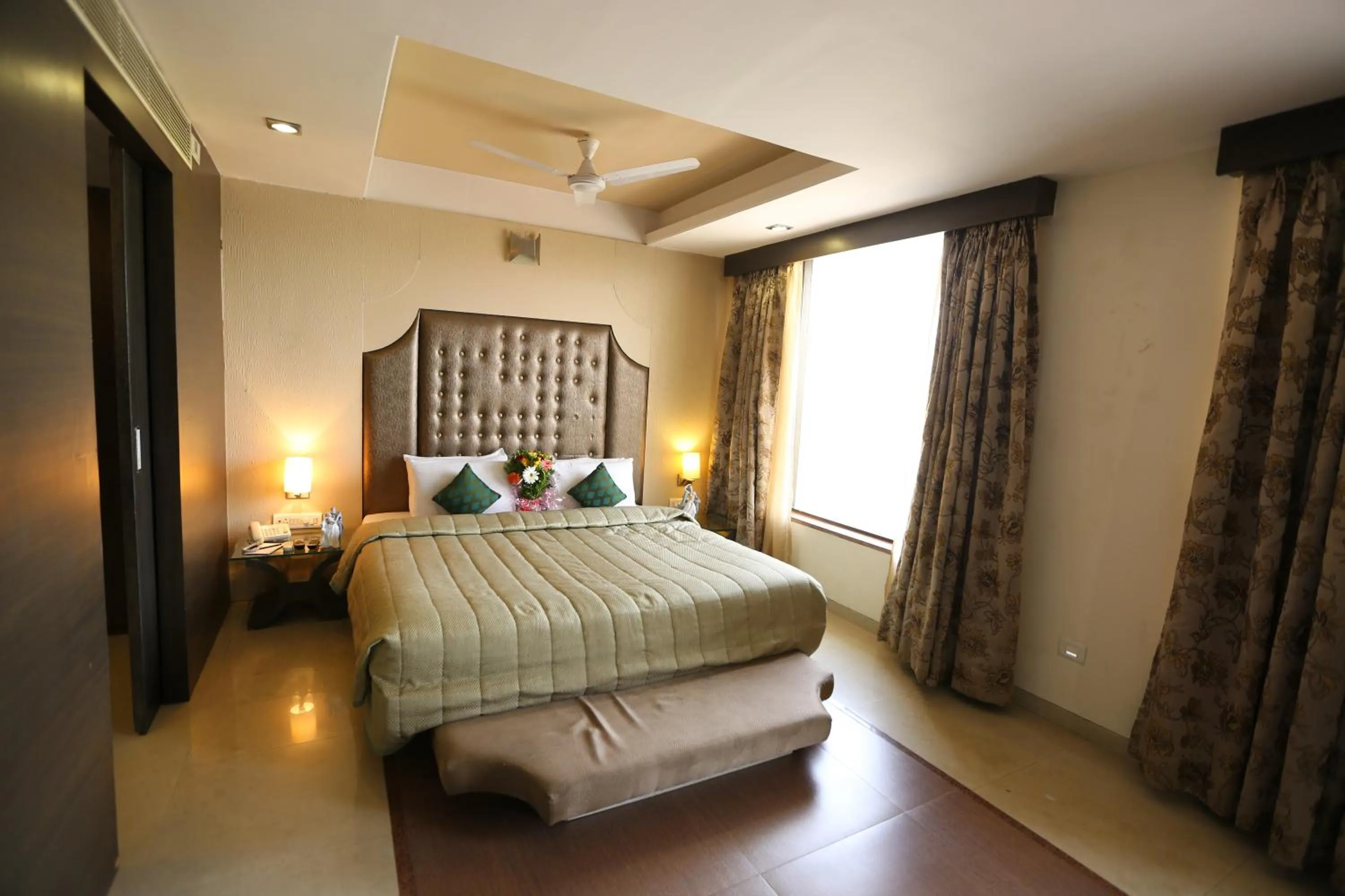 Bed in SilverCloud Hotel and Banquets