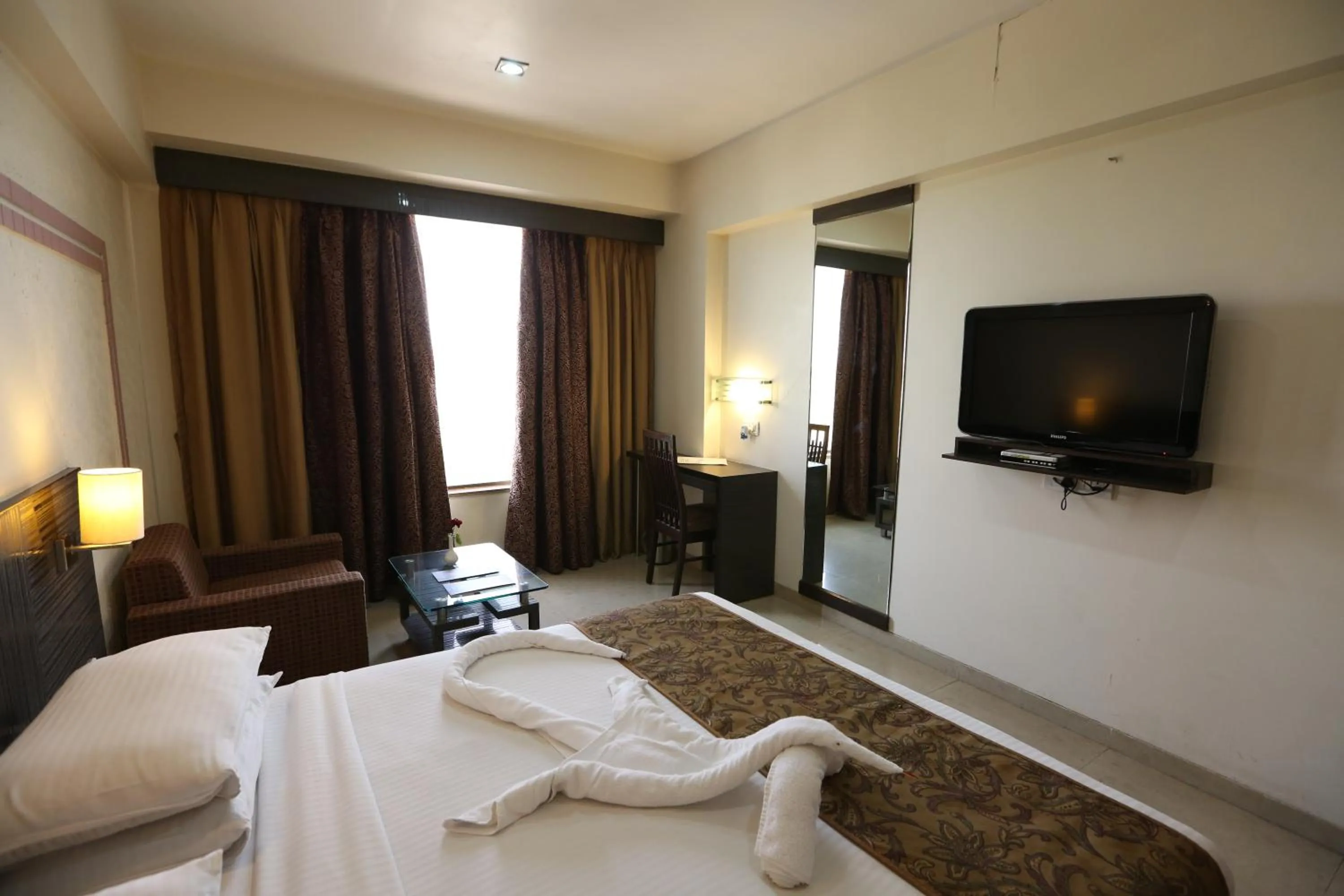 Photo of the whole room, Bed in SilverCloud Hotel and Banquets