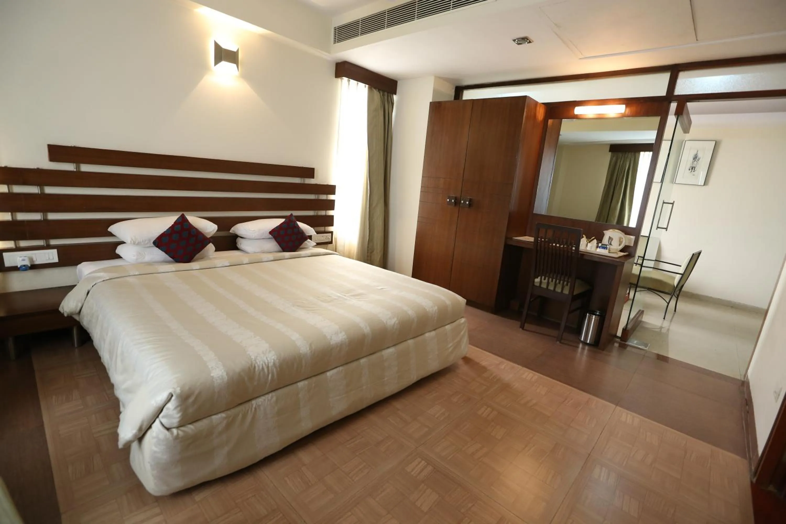 Bed in SilverCloud Hotel and Banquets