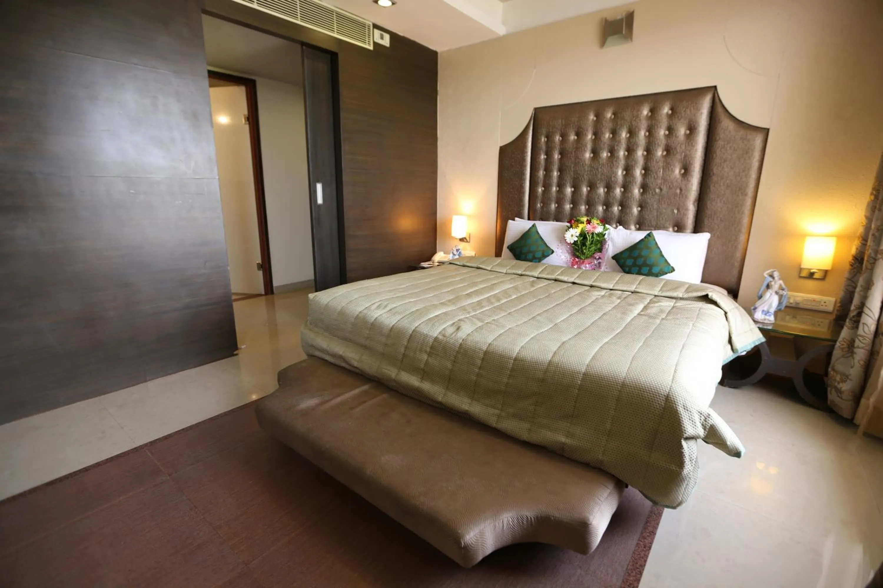 Bed in SilverCloud Hotel and Banquets