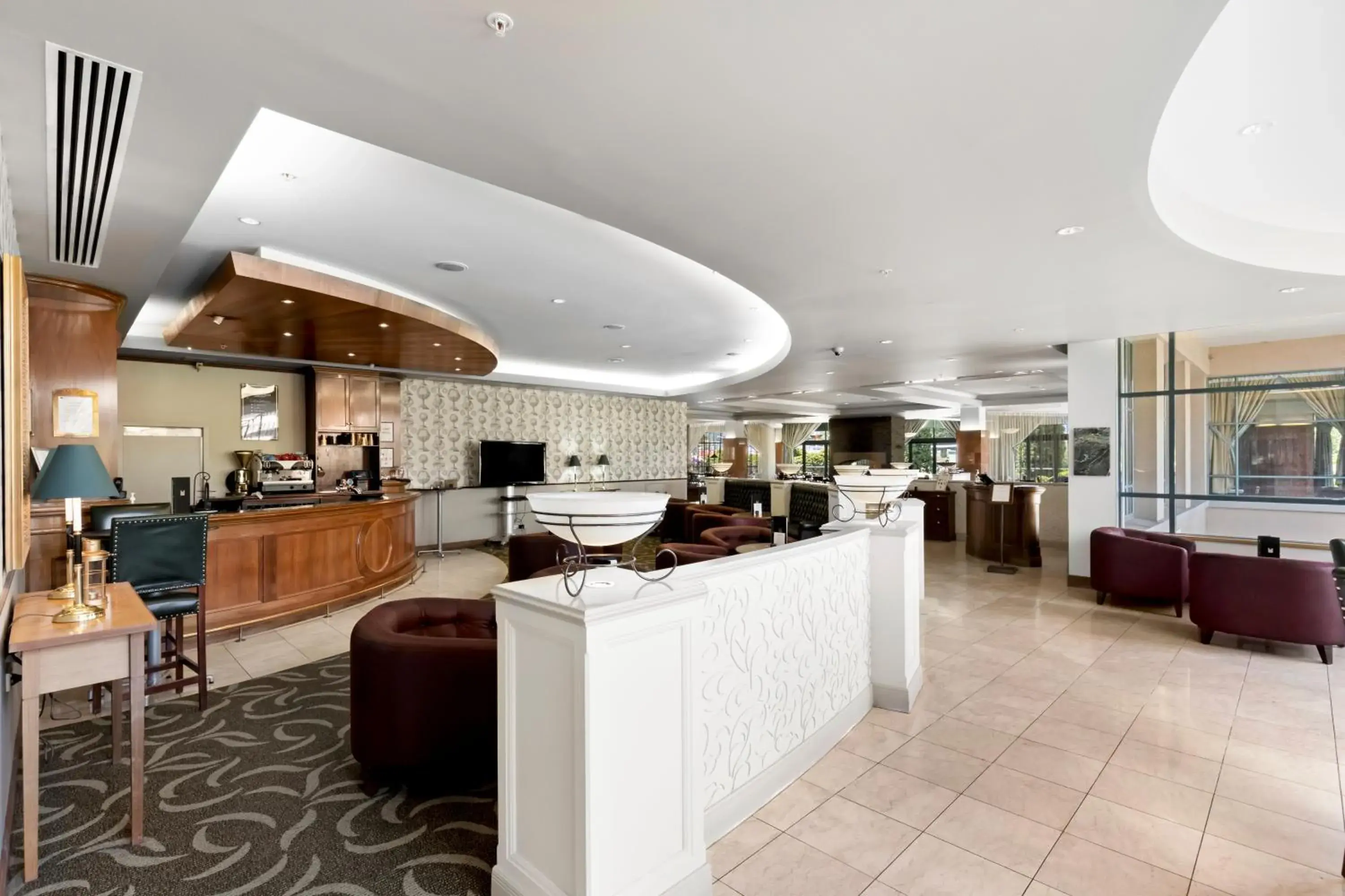 Lounge or bar in Millennium Hotel Queenstown Lounge or bar in Millennium Hotel Queenstown