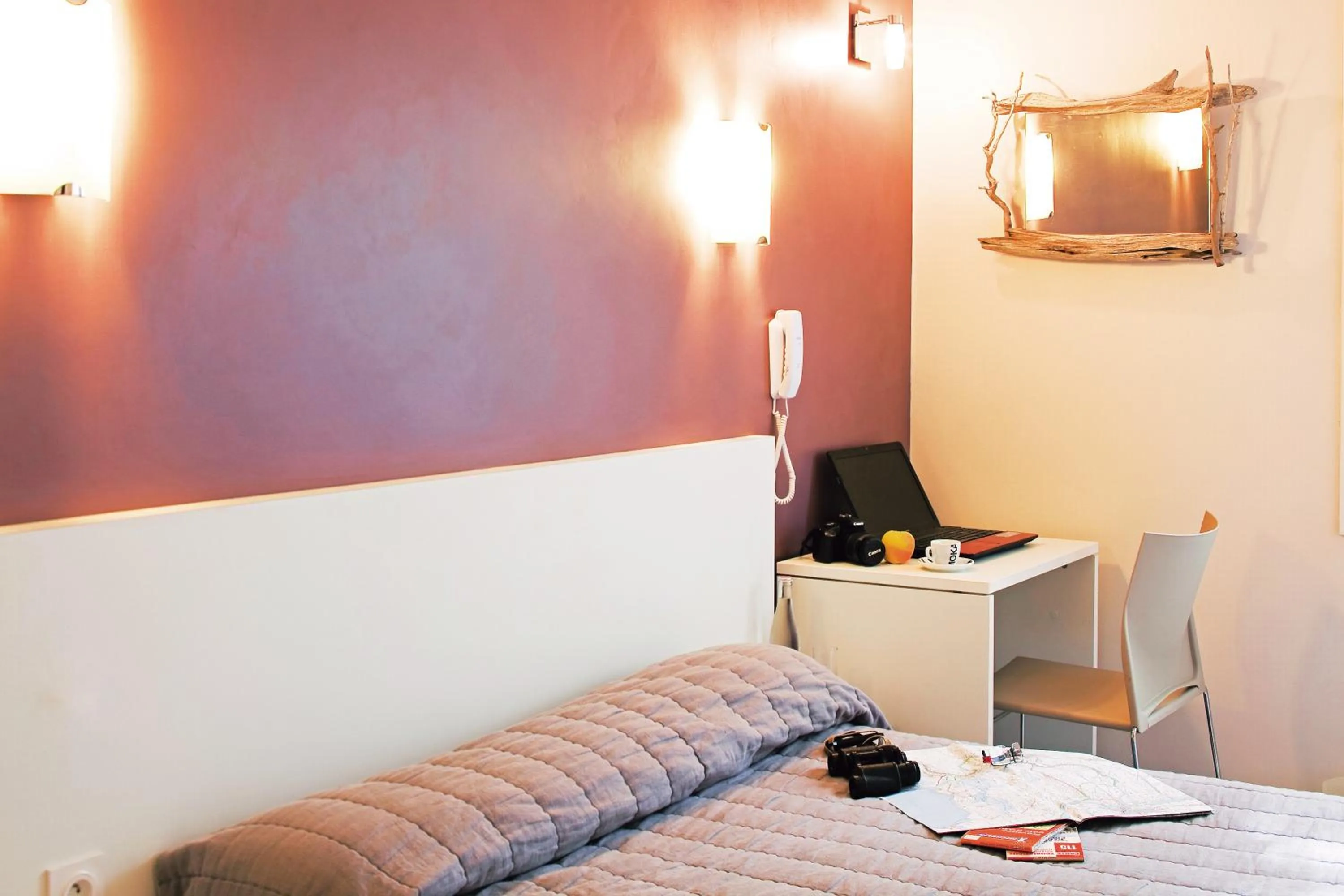 Decorative detail, Bed in Logis Hotel Restaurant Le Flamant Rose camargue