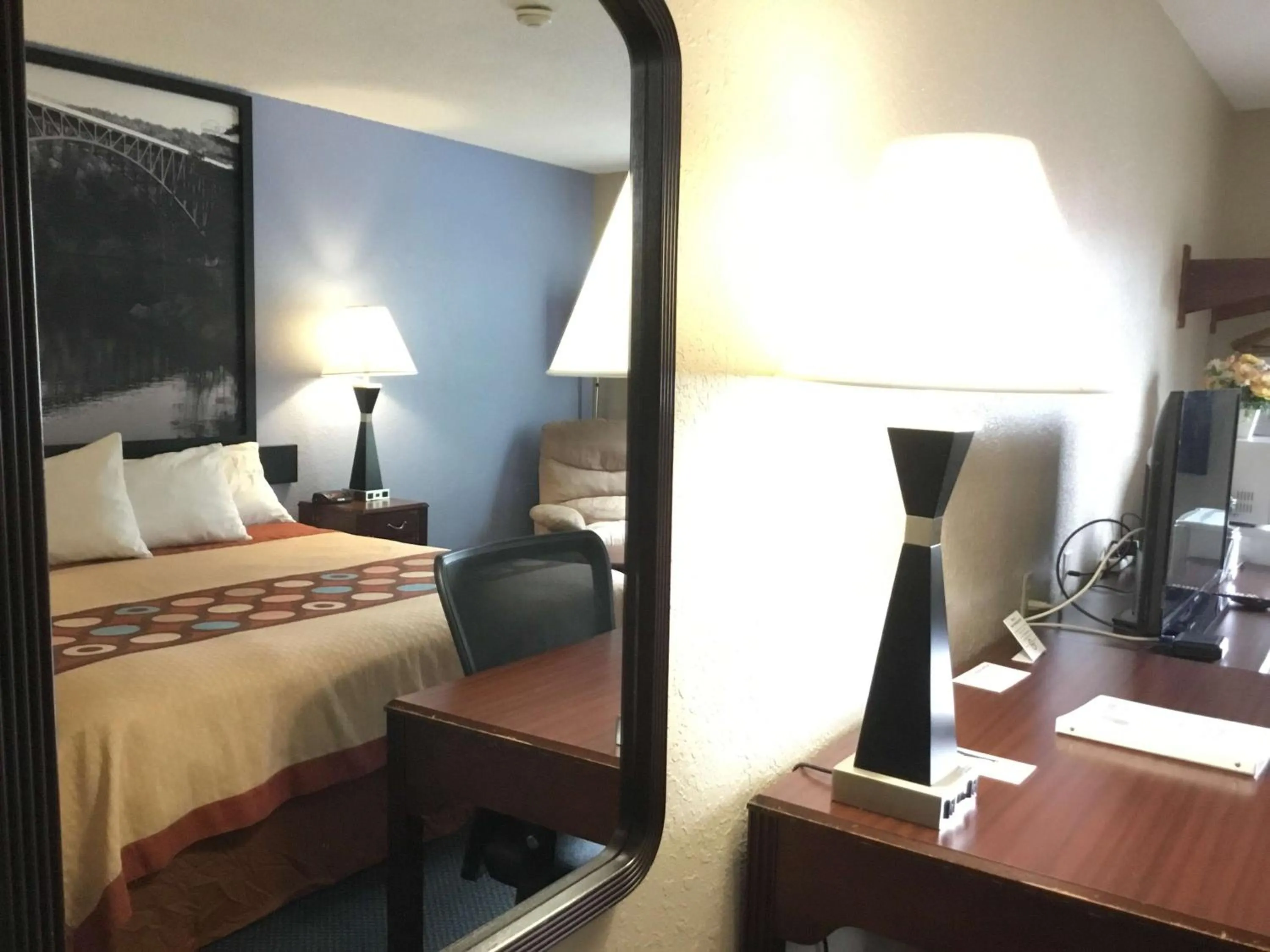 Photo of the whole room, TV/Entertainment Center in Super 8 by Wyndham Gardner