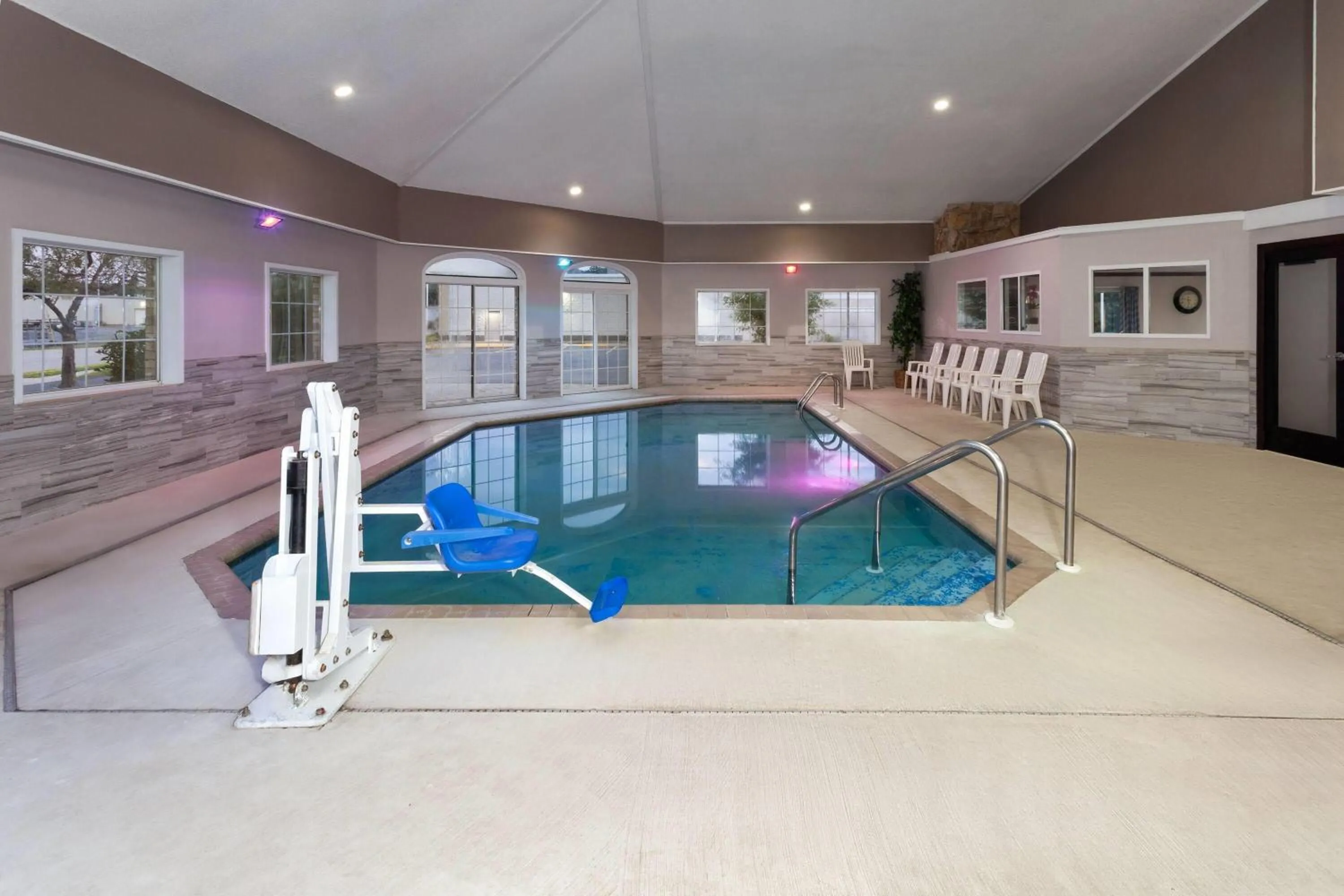Swimming pool in Days Inn & Suites by Wyndham Kaukauna WI
