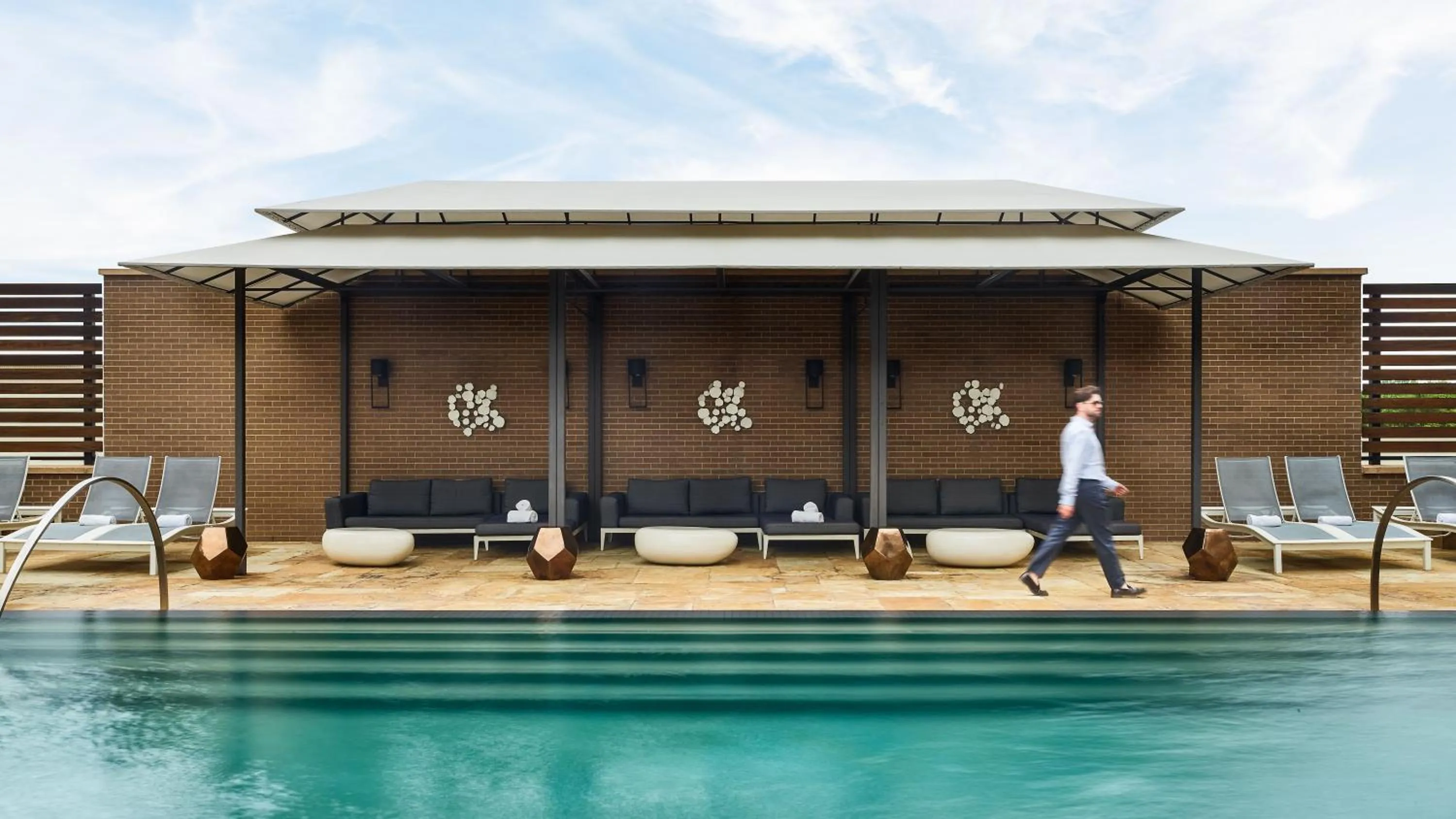 Swimming pool in The Highland Dallas, Curio Collection by Hilton