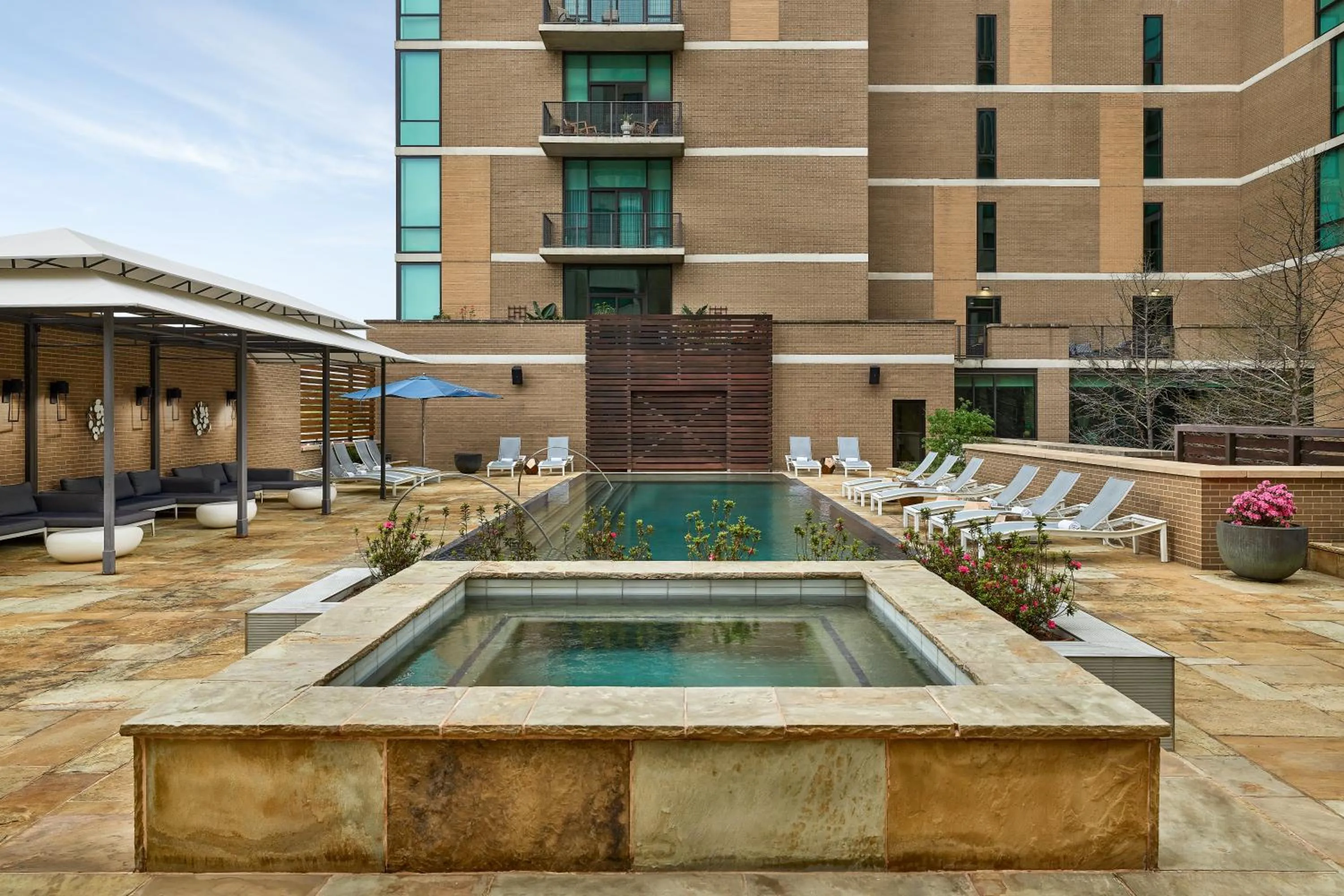 Swimming pool in The Highland Dallas, Curio Collection by Hilton