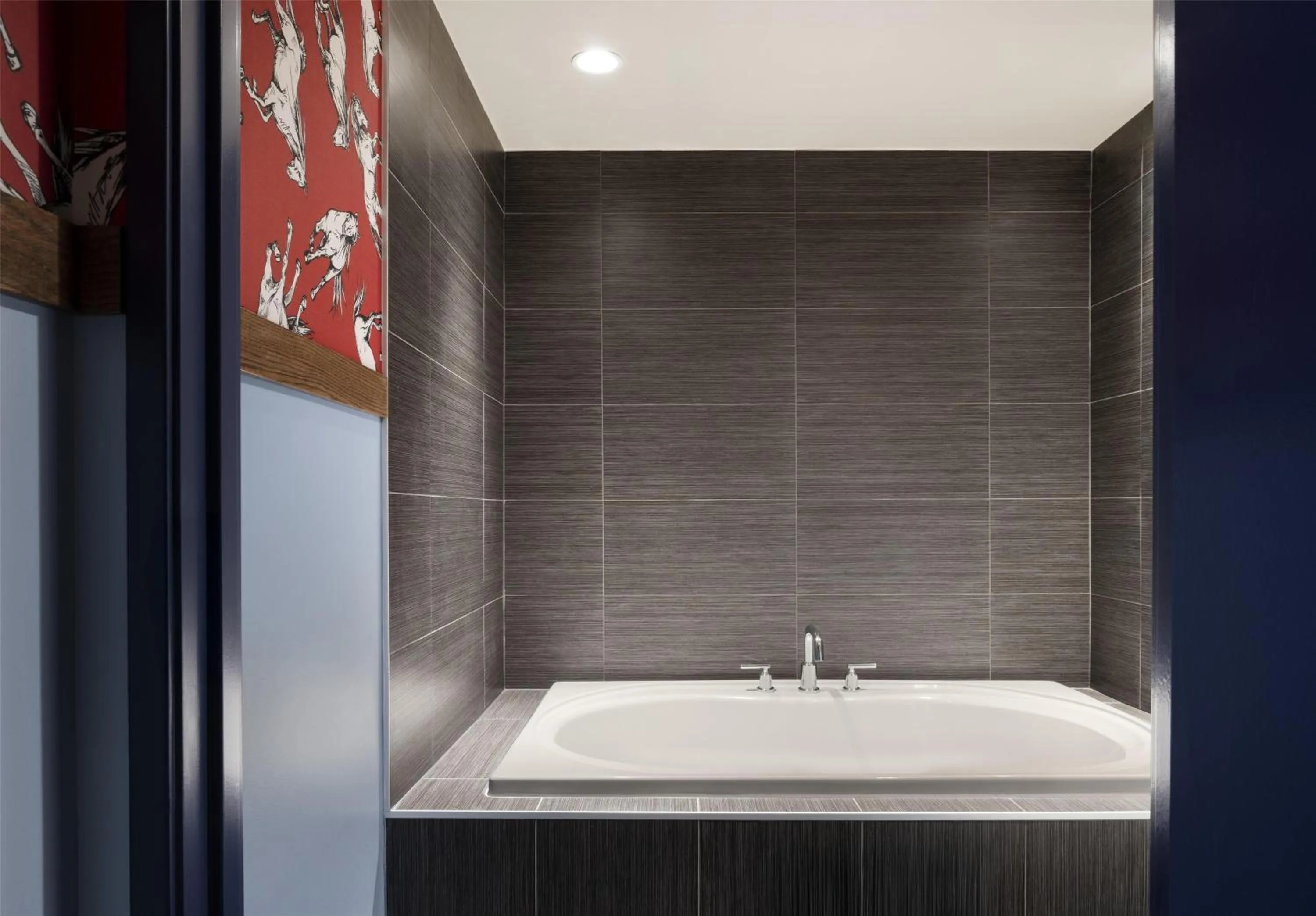 Bathroom in Graduate by Hilton Dallas