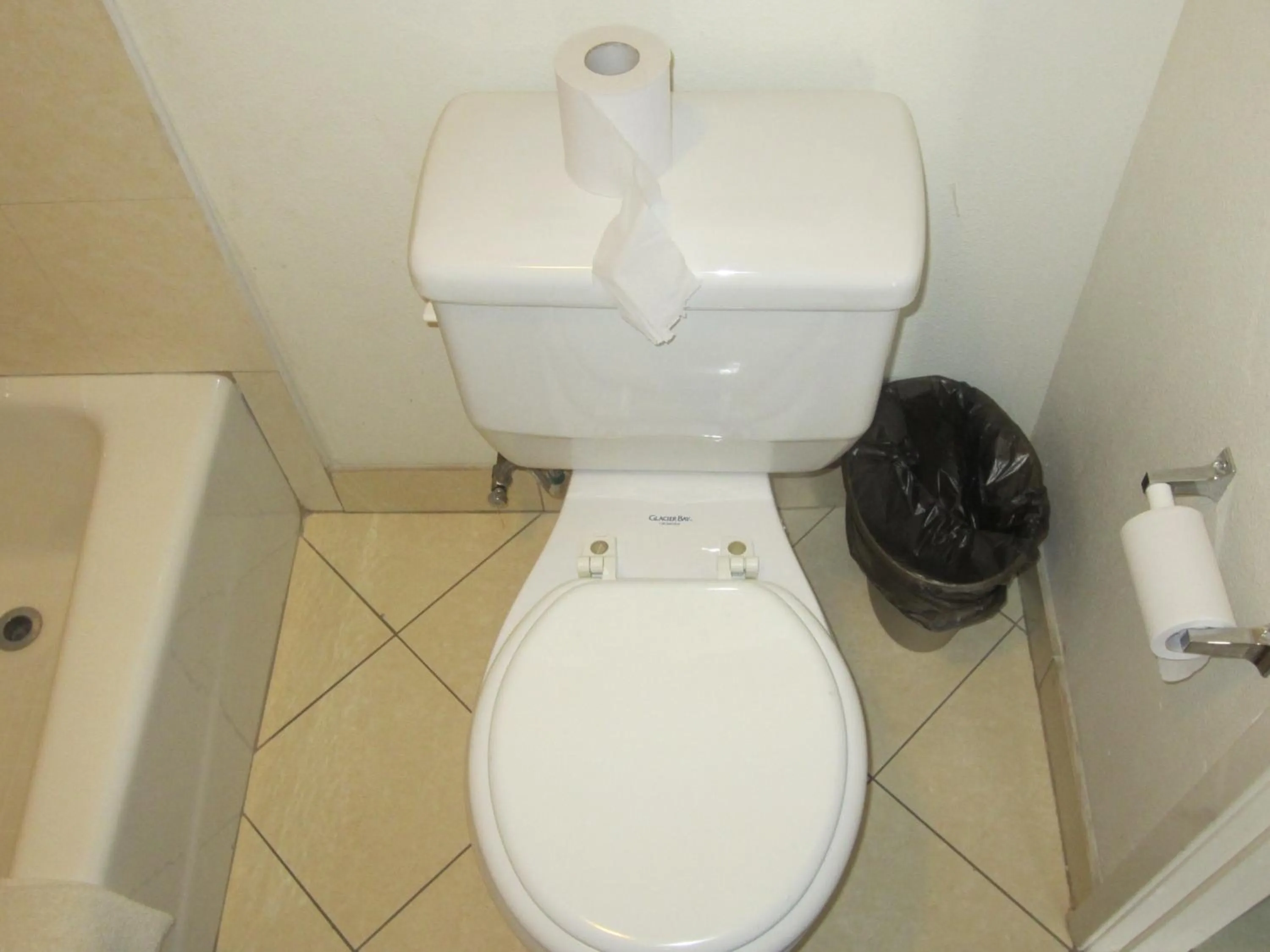 Toilet in Starlight Inn Van Nuys