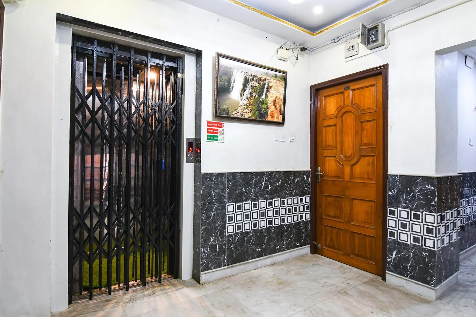 elevator in FabHotel Wild Orchid - 800m from Medica Superspecialty Hospital