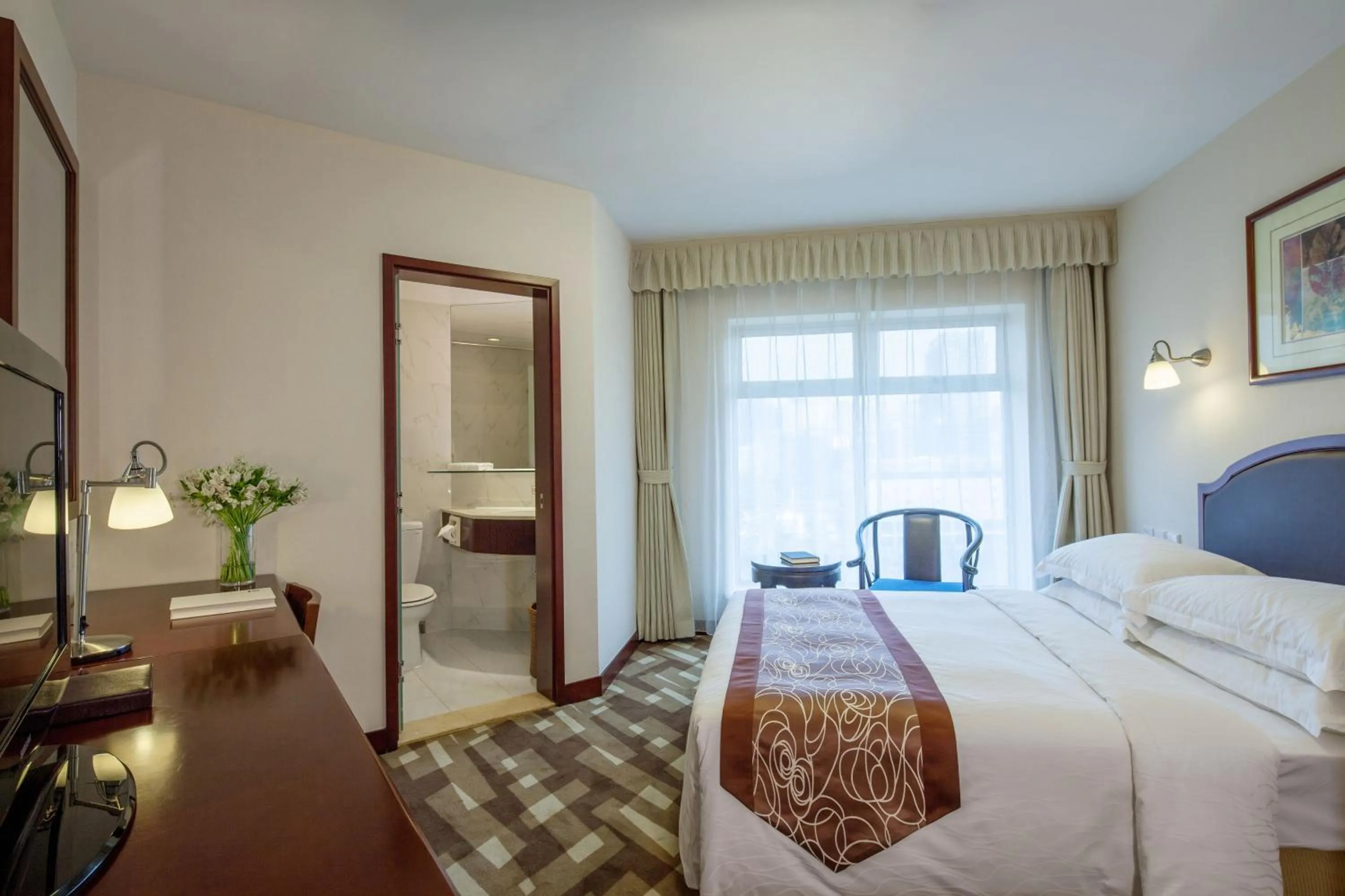 Photo of the whole room, Bed in Beijing Landmark Towers