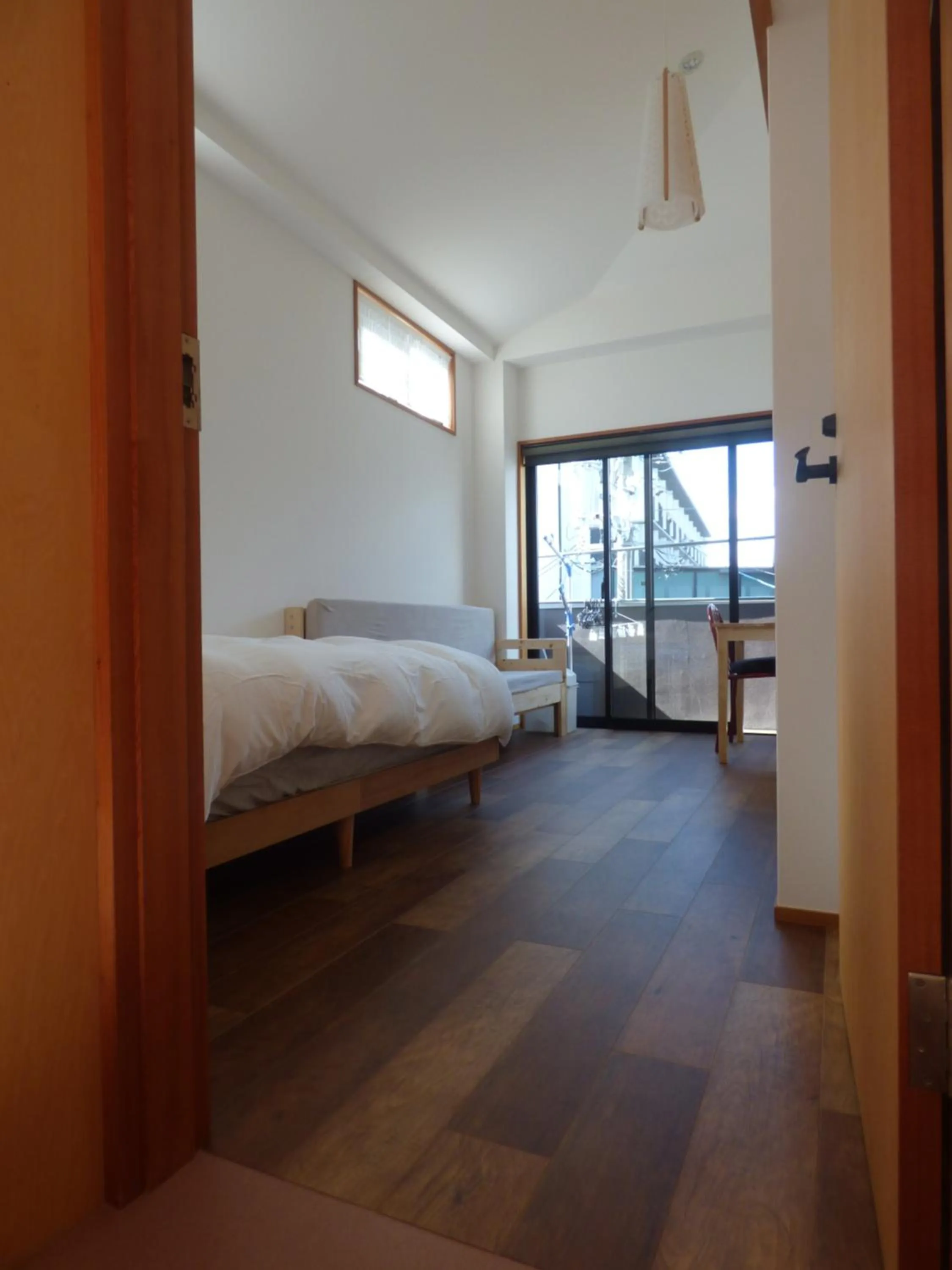 Photo of the whole room, Bed in Guesthouse Hyakumanben Cross