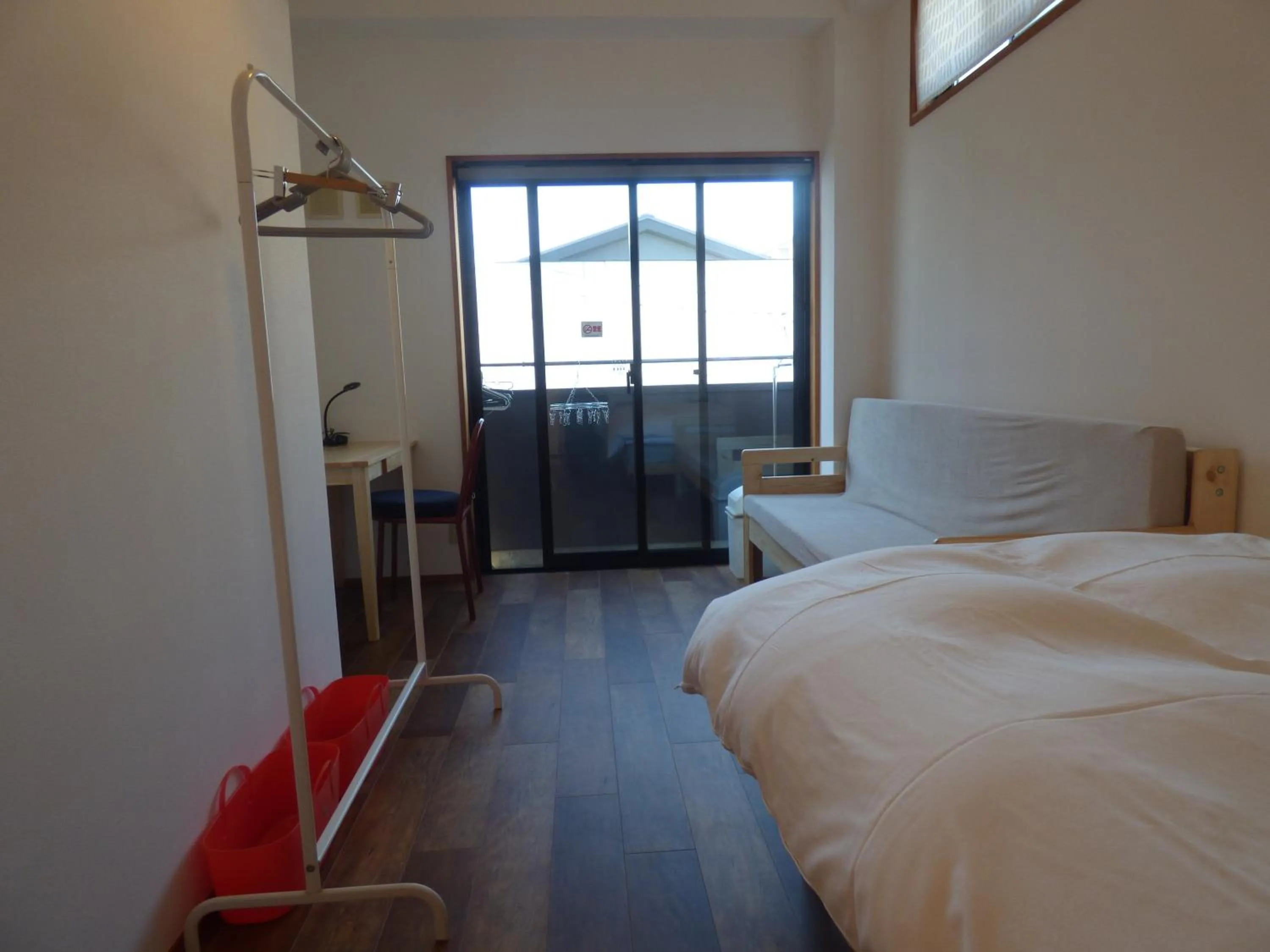 Bed in Guesthouse Hyakumanben Cross