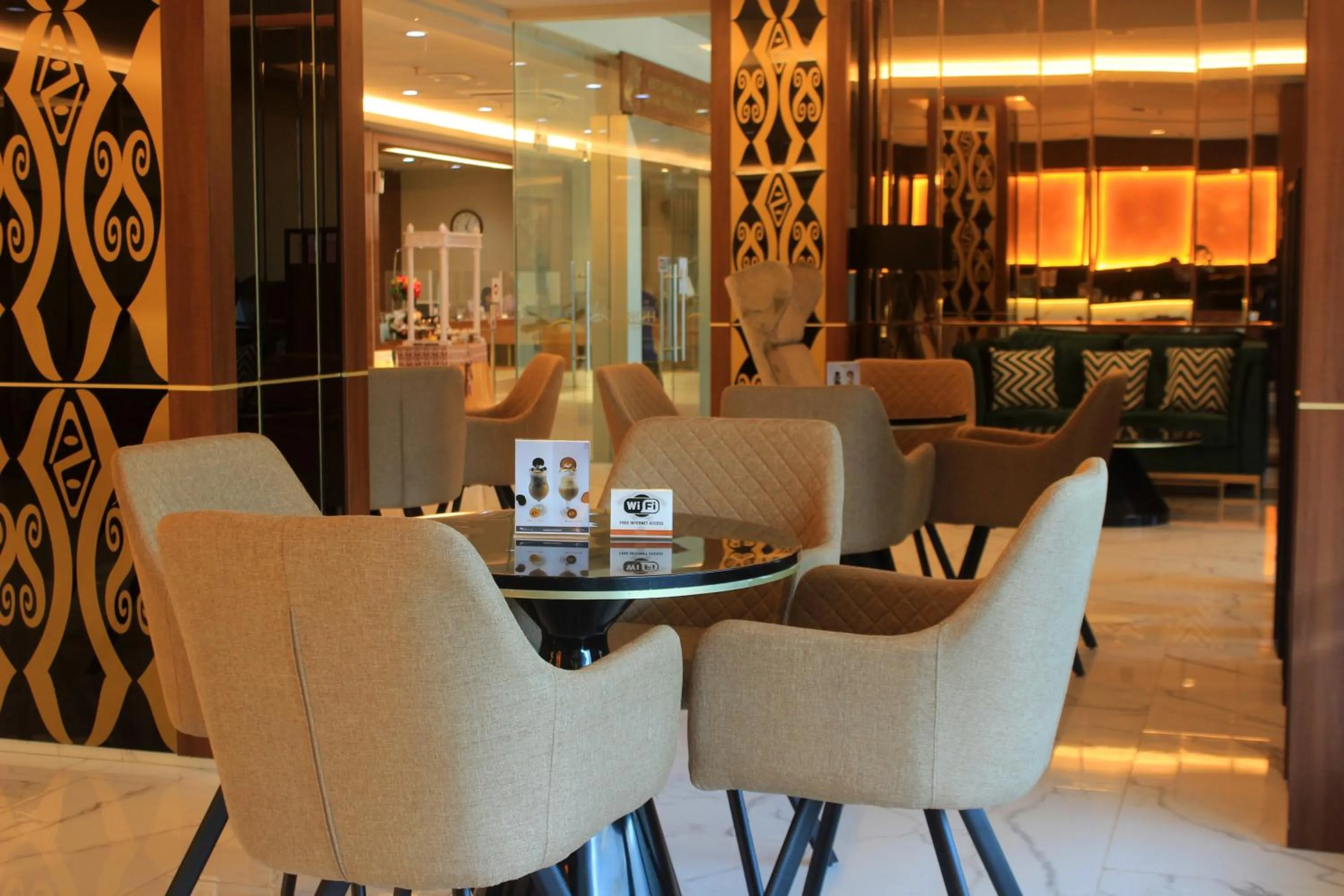 Communal lounge/ TV room in Swiss-Belexpress Jayapura