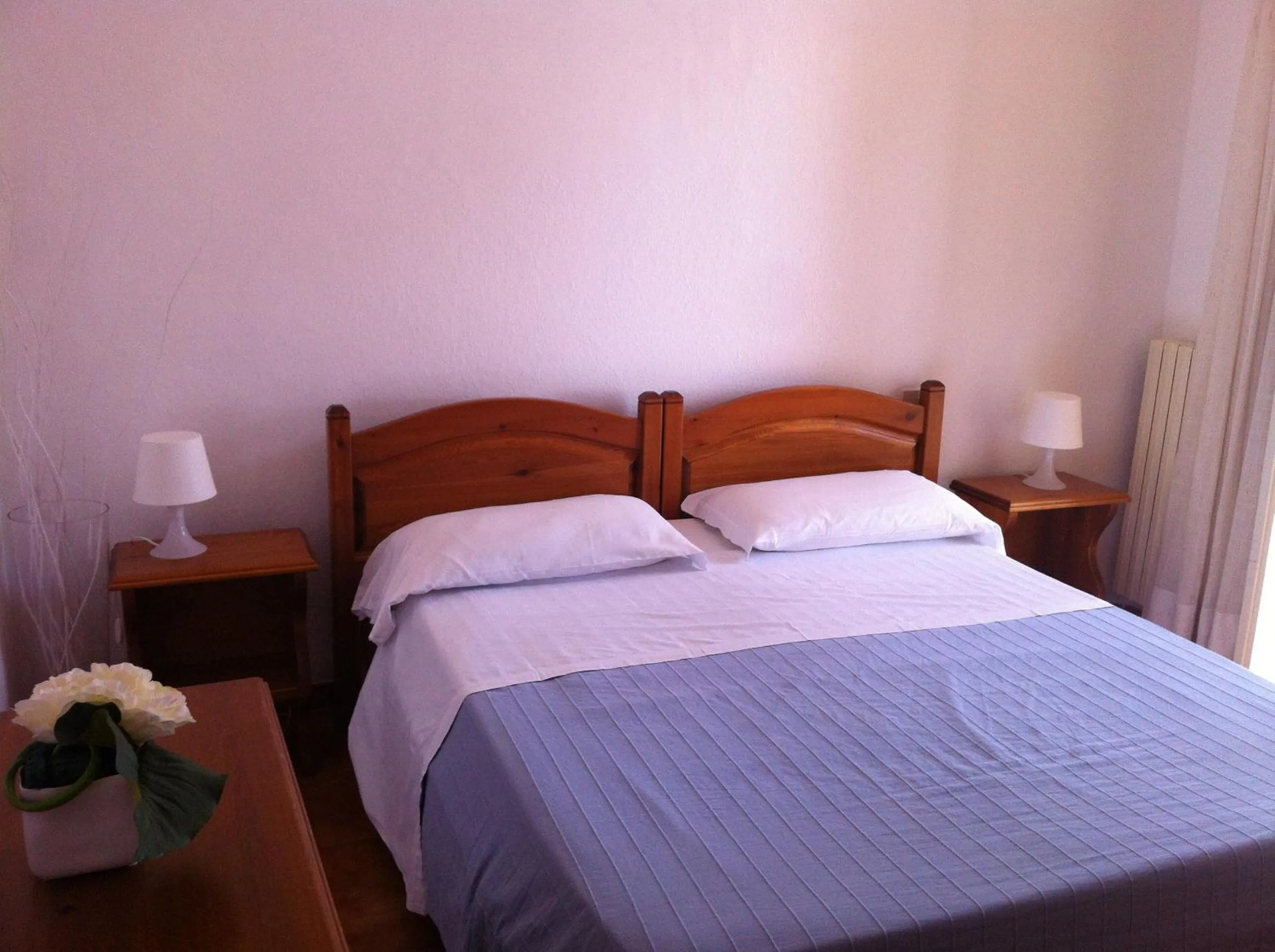 Bed in Hotel Villa Antonio