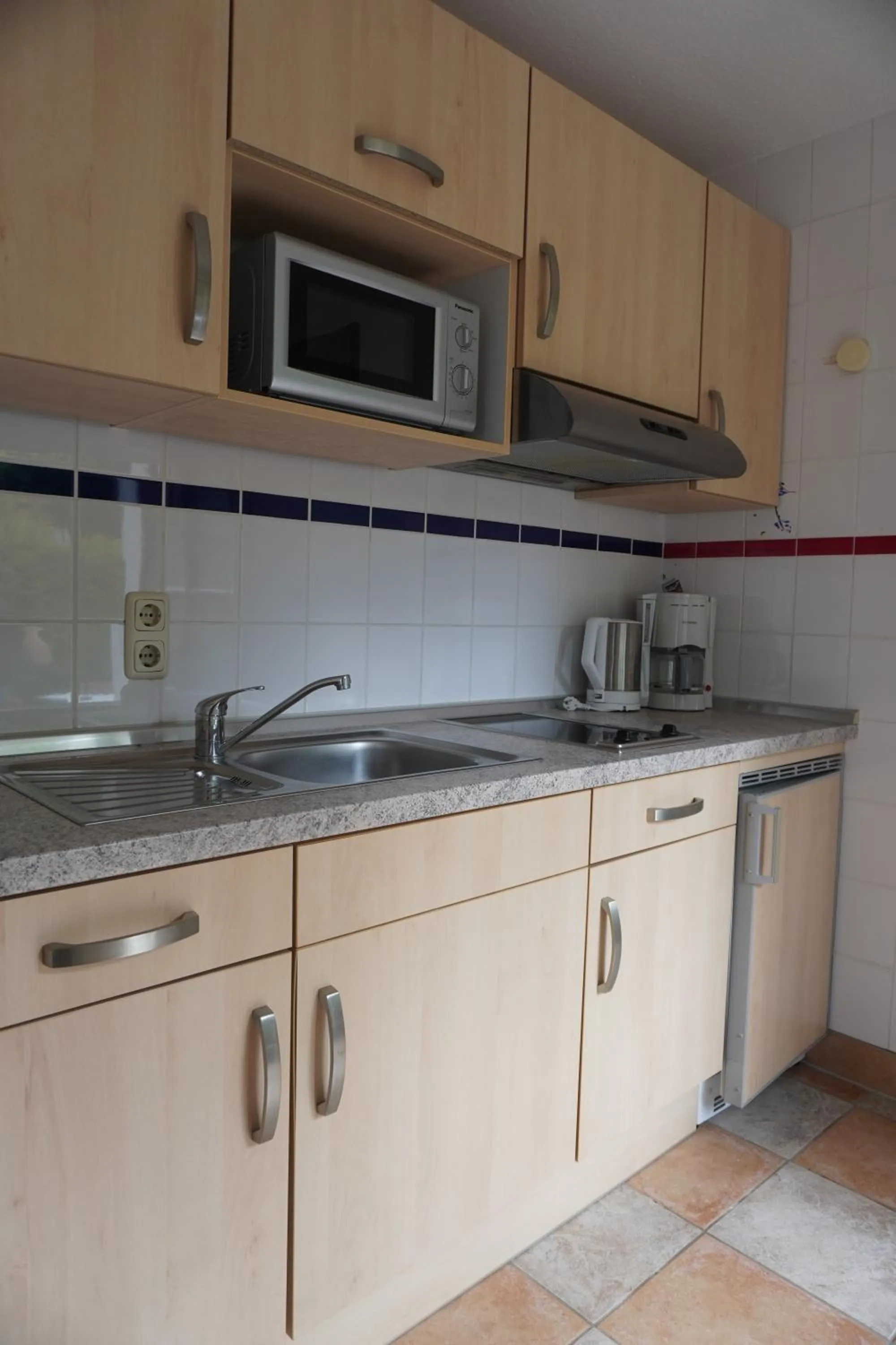 Kitchen or kitchenette in Alcor Hotel Feriendorf an der Ostsee