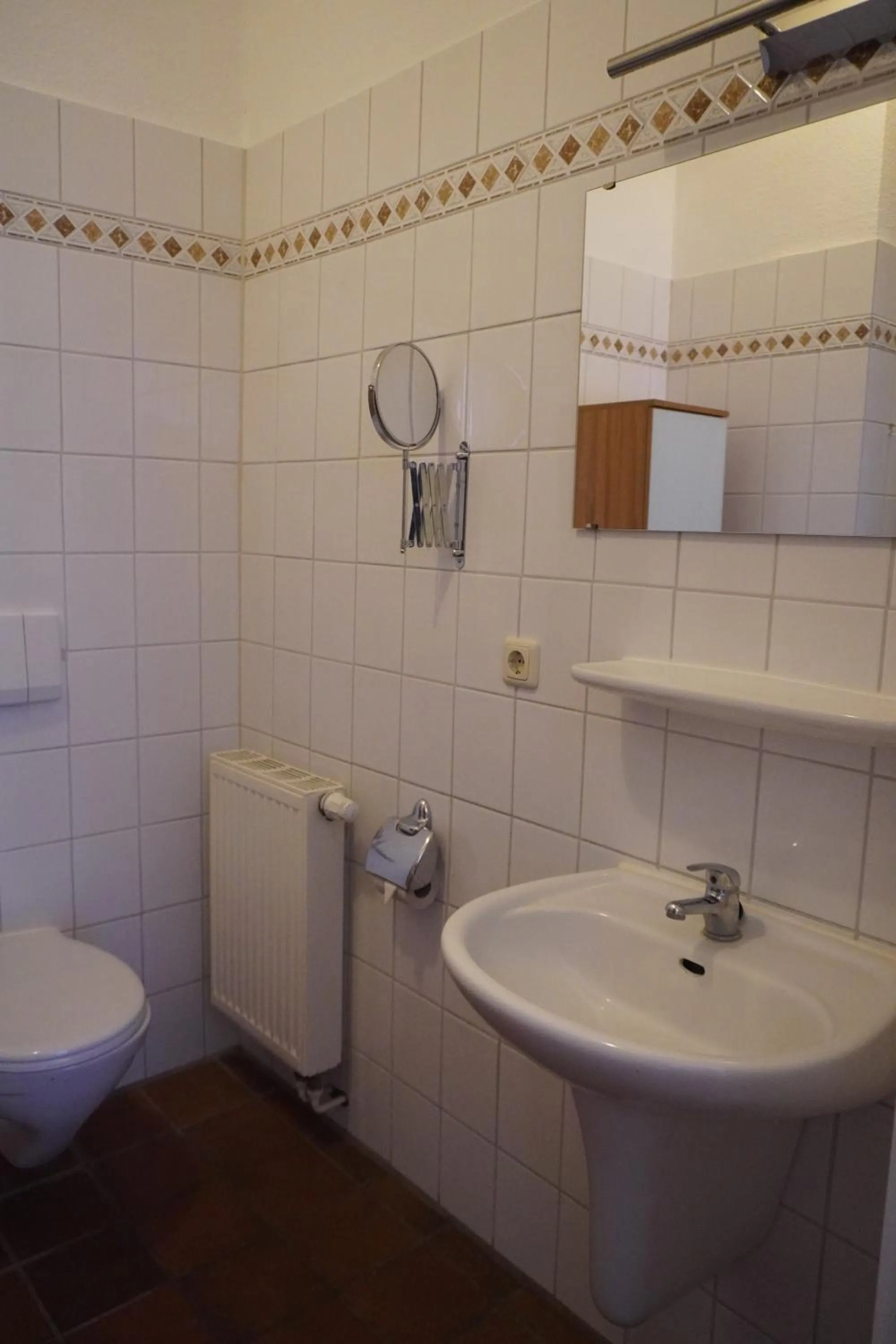 Toilet in Alcor Hotel Feriendorf an der Ostsee