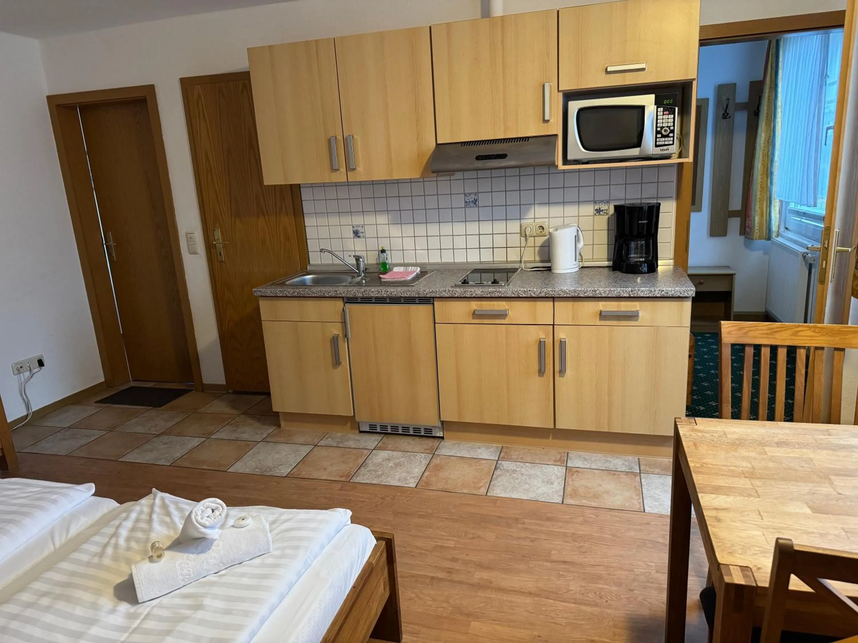 Kitchen or kitchenette in Alcor Hotel Feriendorf an der Ostsee