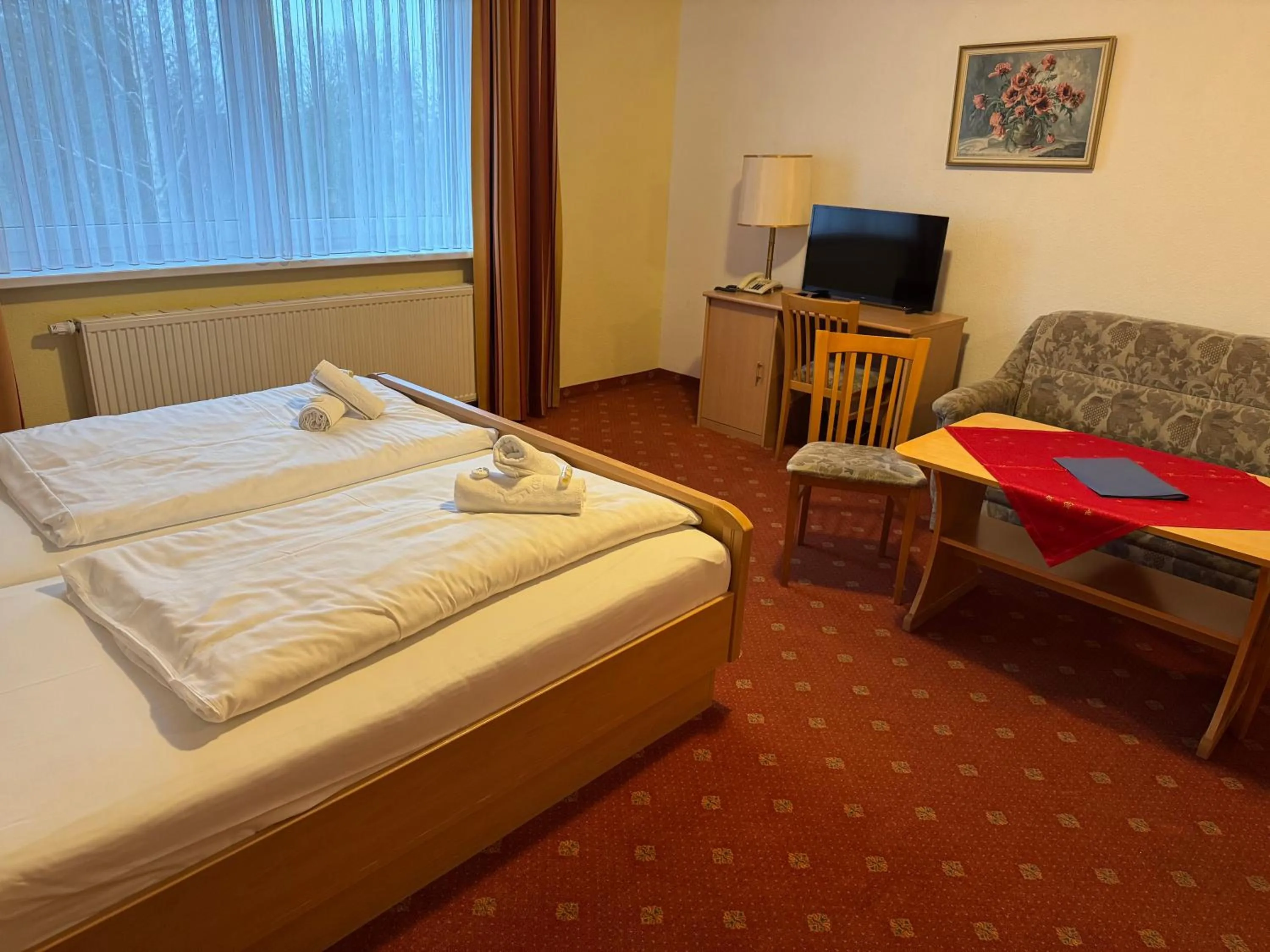 Bed in Alcor Hotel Feriendorf an der Ostsee