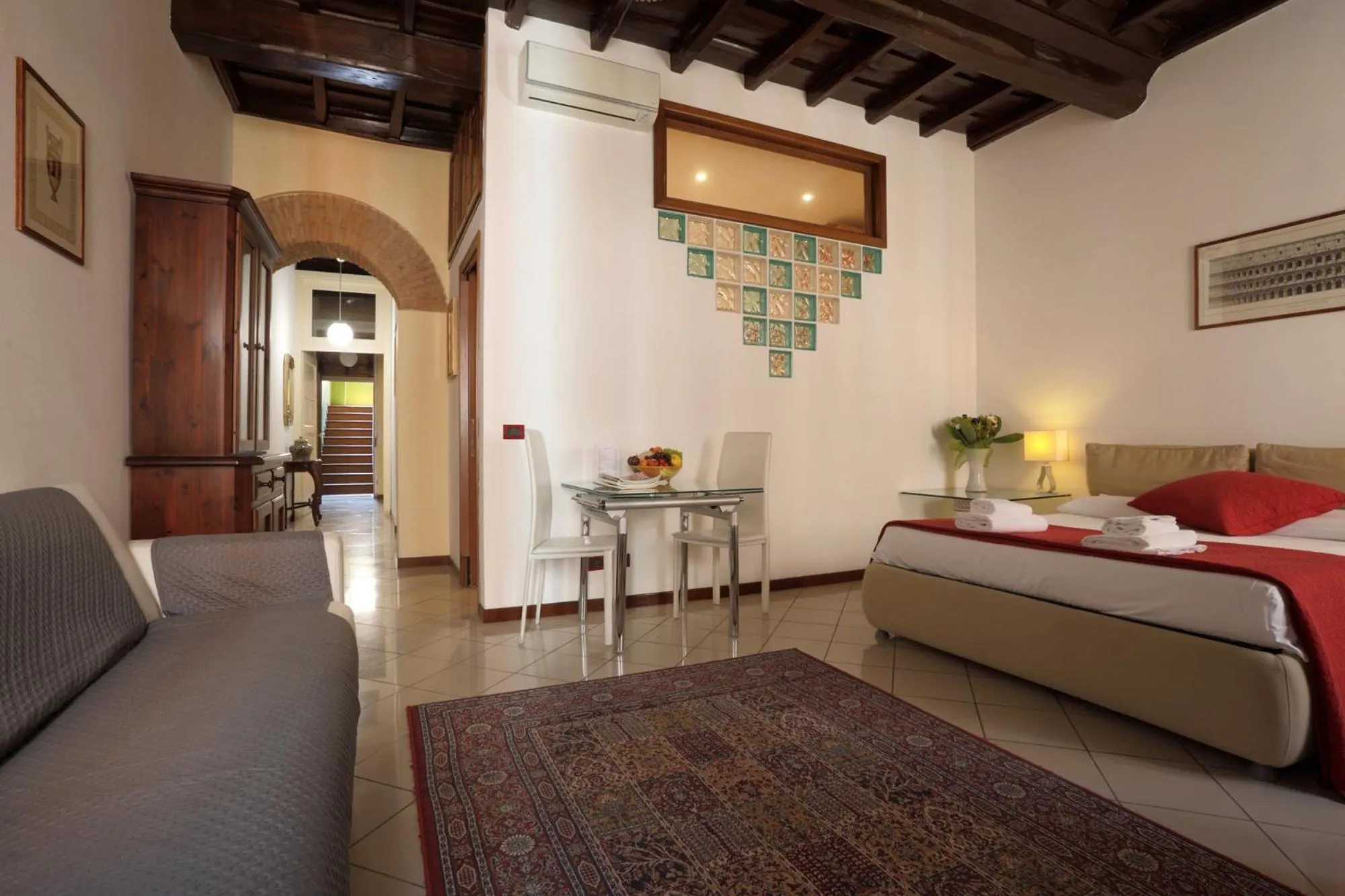 Living room, Bed in Borgo Pio 91