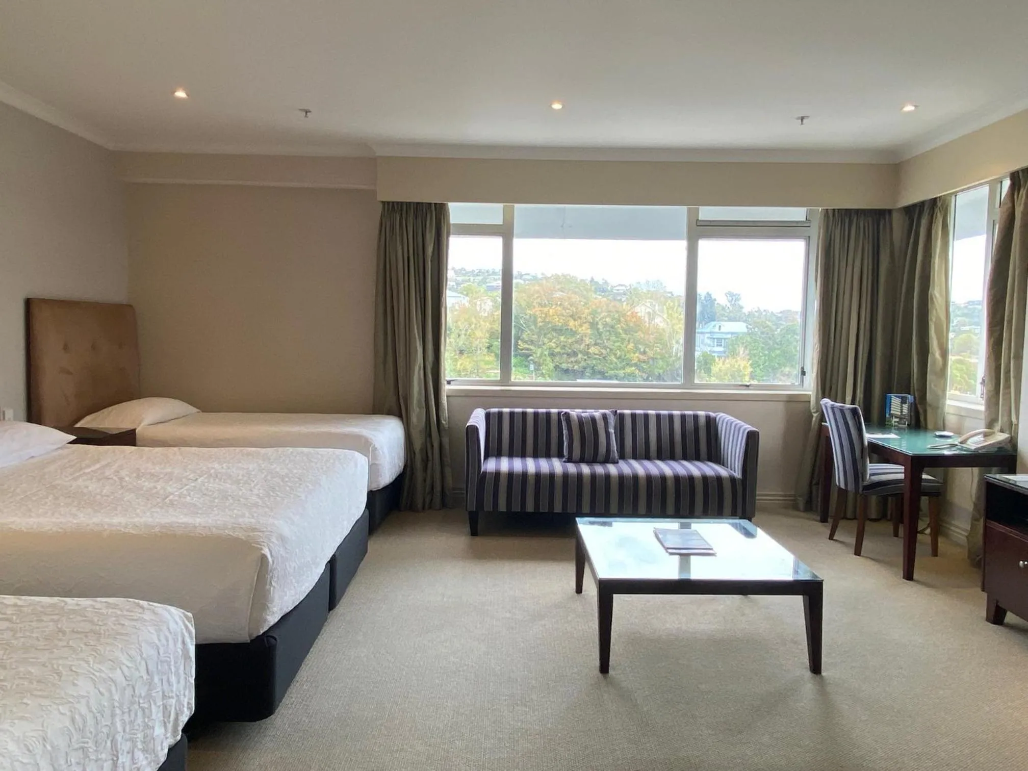 Living room, Bed in Rutherford Hotel Nelson - A Heritage Hotel