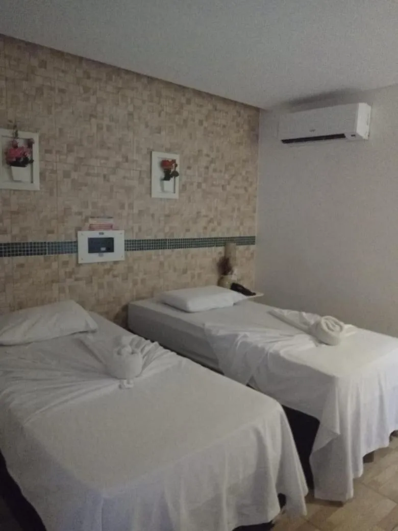 Bed in Hotel Cajuína City