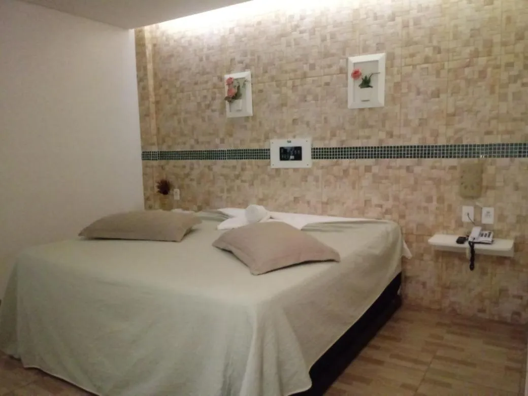 Bed in Hotel Cajuína City