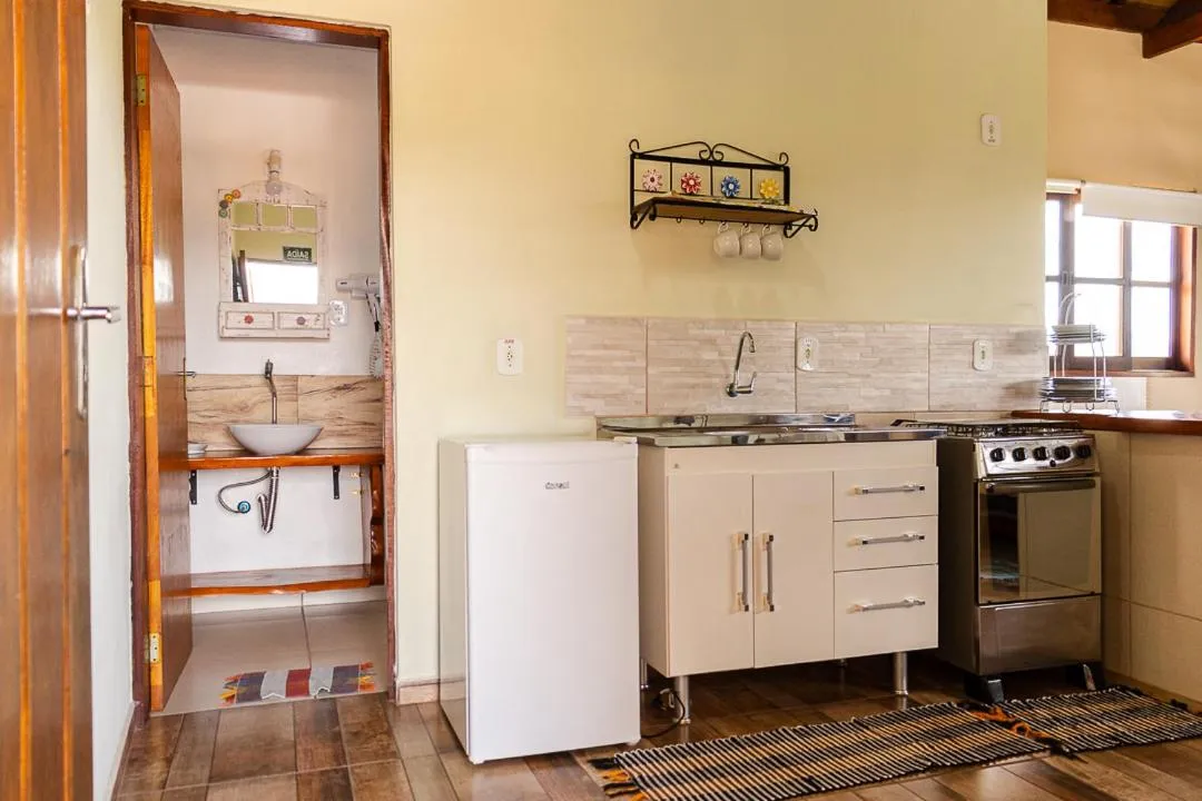 Kitchen or kitchenette in Pousada Chalés São Francisco