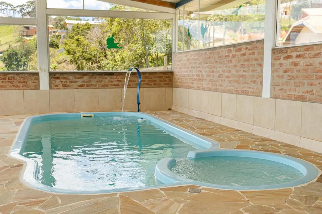 Swimming pool in Pousada Chalés São Francisco