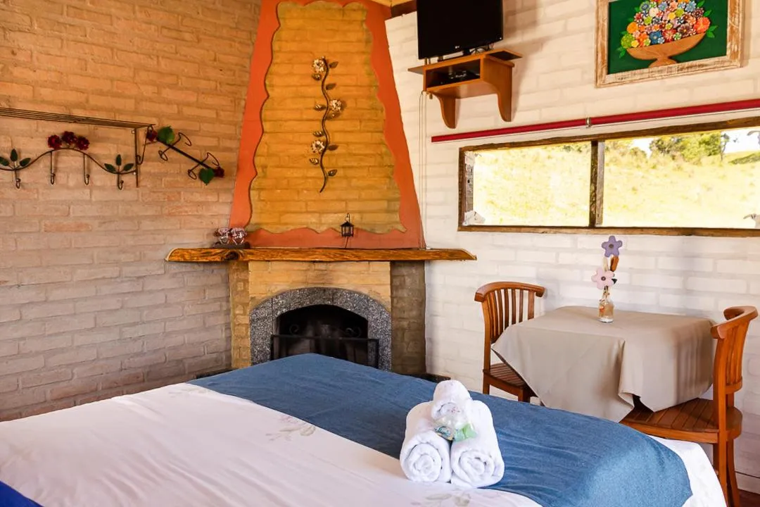 TV and multimedia, Bed in Pousada Chalés São Francisco