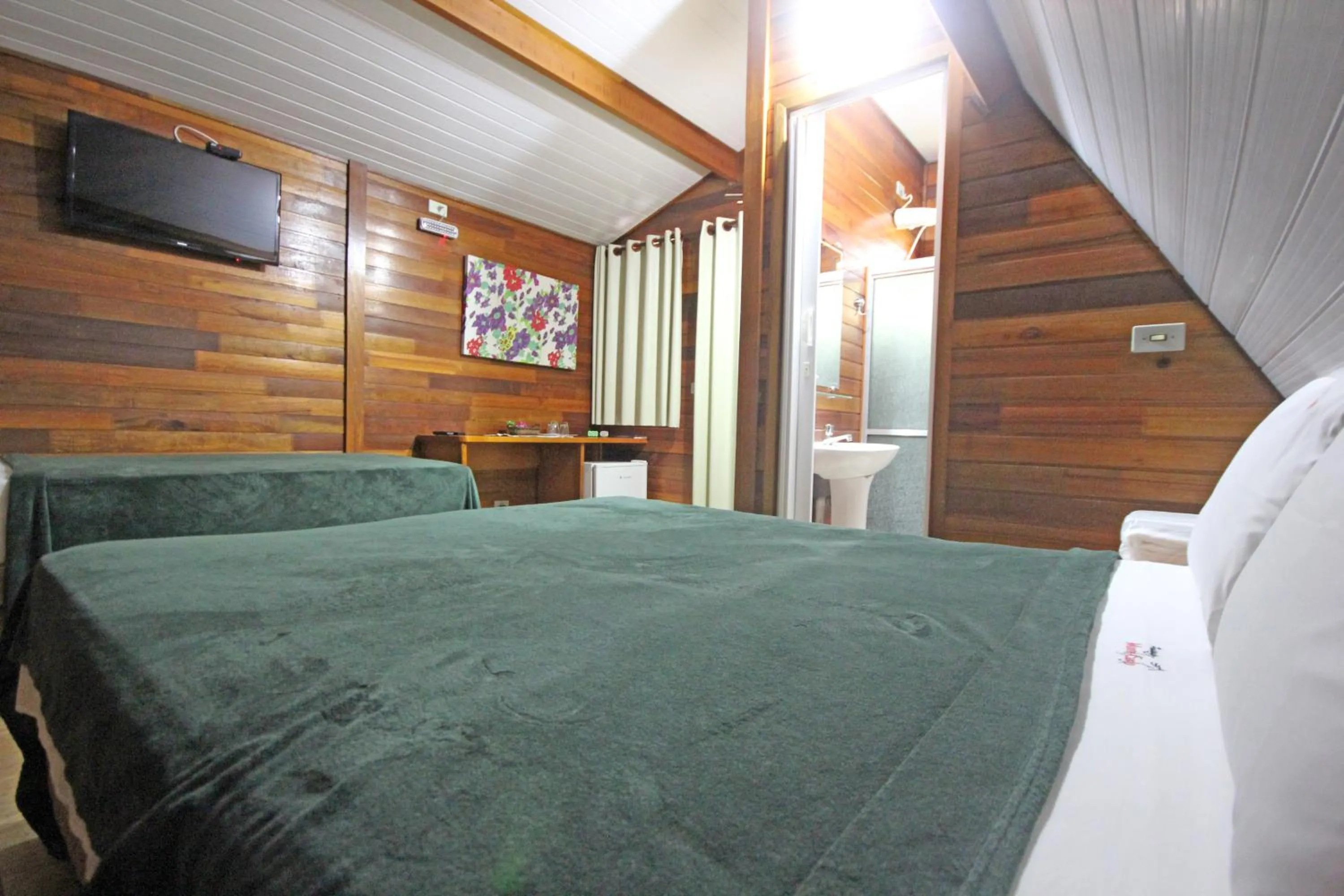 Bed in Monte Carlo Pousada