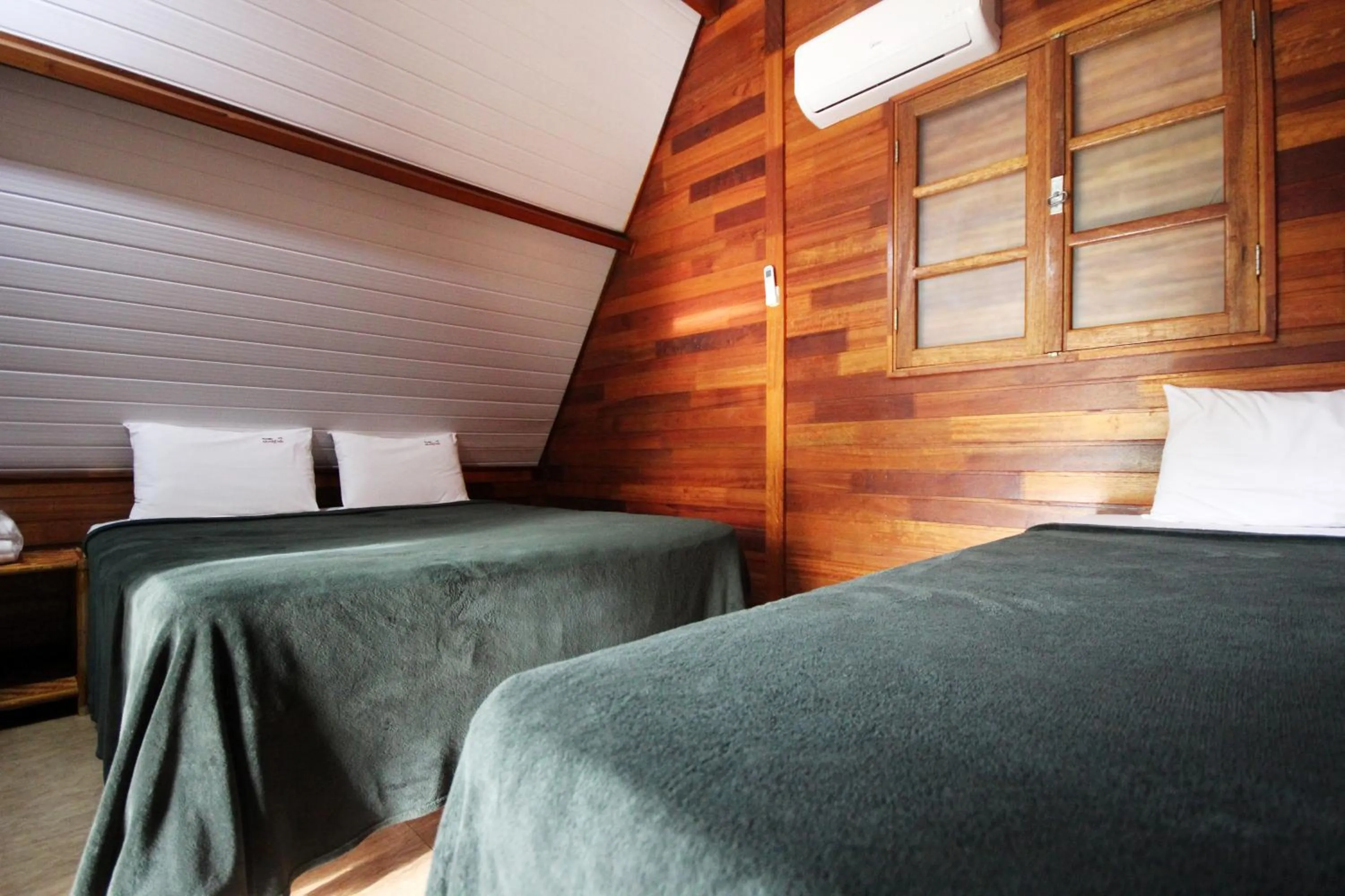 Bed in Monte Carlo Pousada