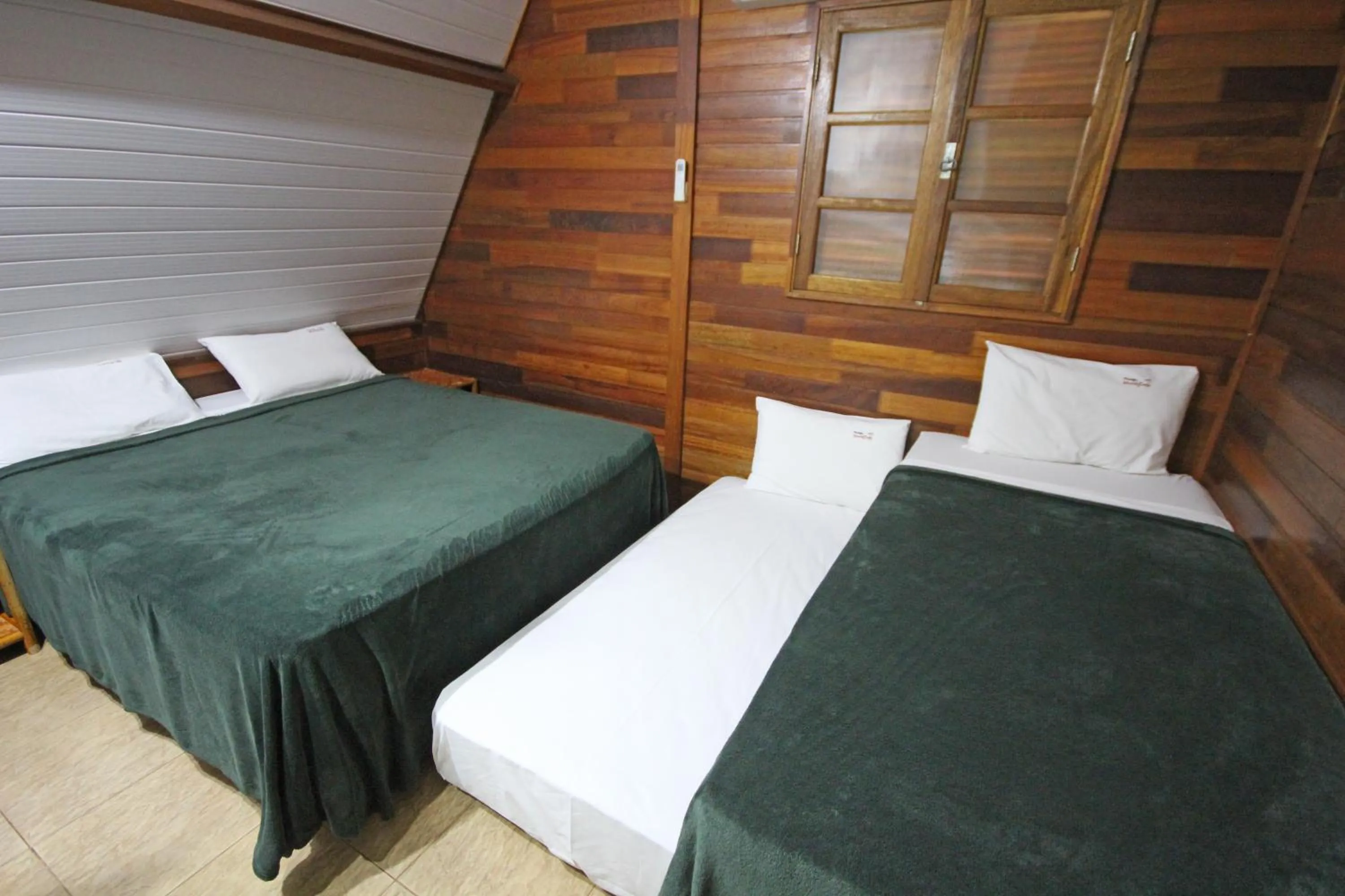 Bed in Monte Carlo Pousada