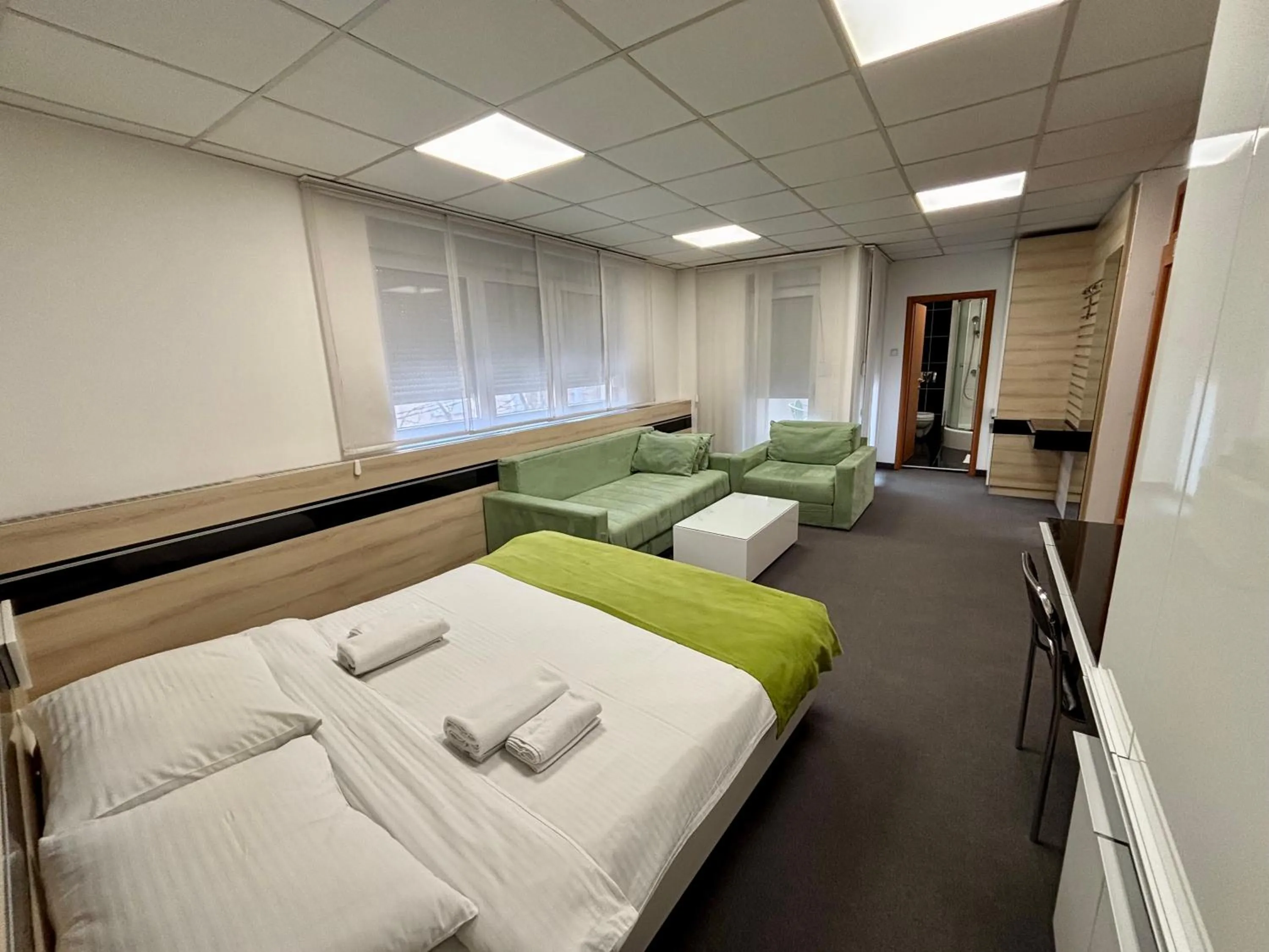 Bed in Garni Hotel Consul