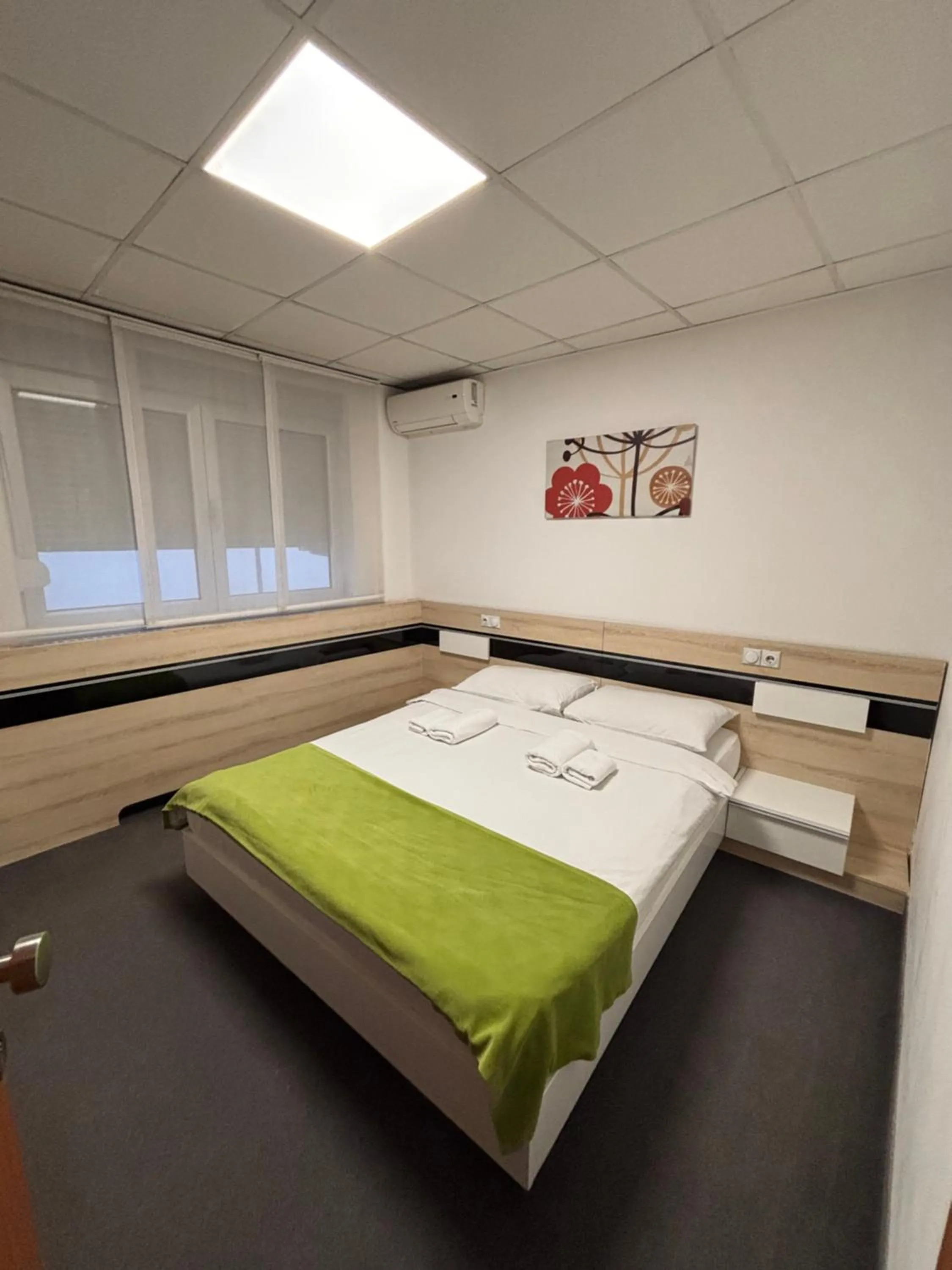 Bed in Garni Hotel Consul